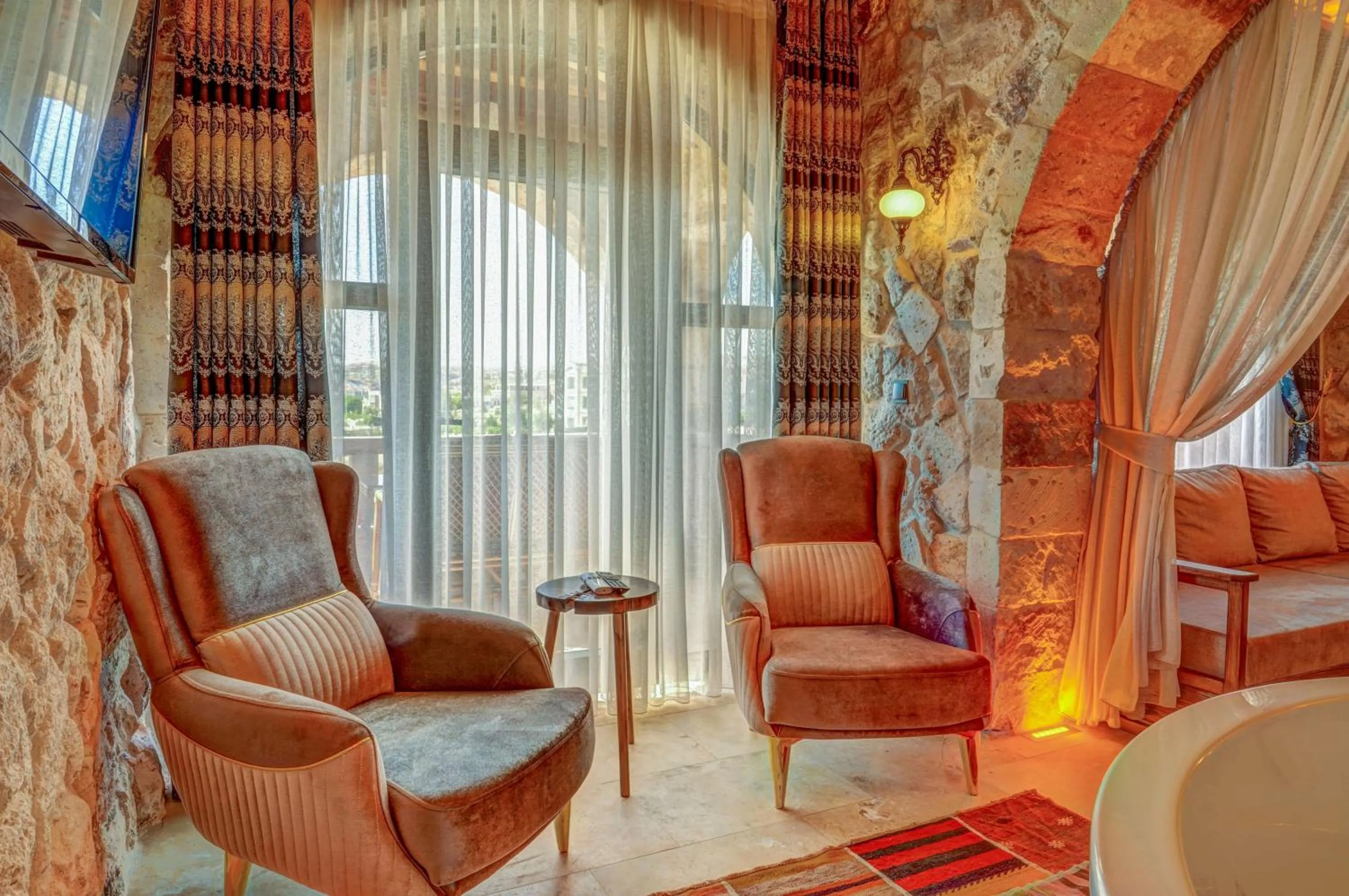 Seating area in Kasr-ı Kapadokya Cave Suites