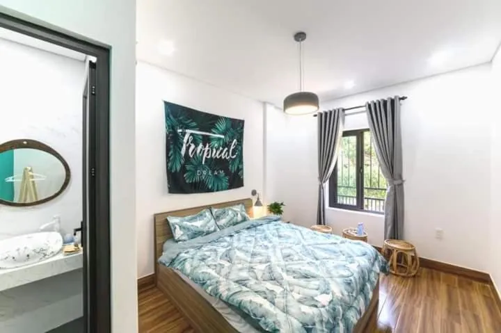 Photo of the whole room, Bed in Kivi Homestay Hoi An