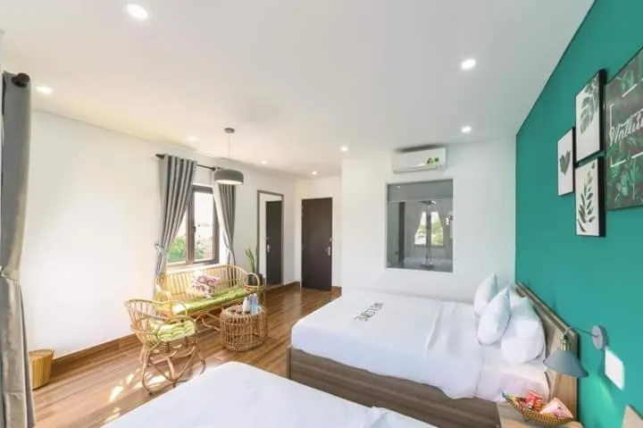 Photo of the whole room, Bed in Kivi Homestay Hoi An