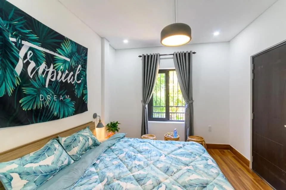 Bed in Kivi Homestay Hoi An