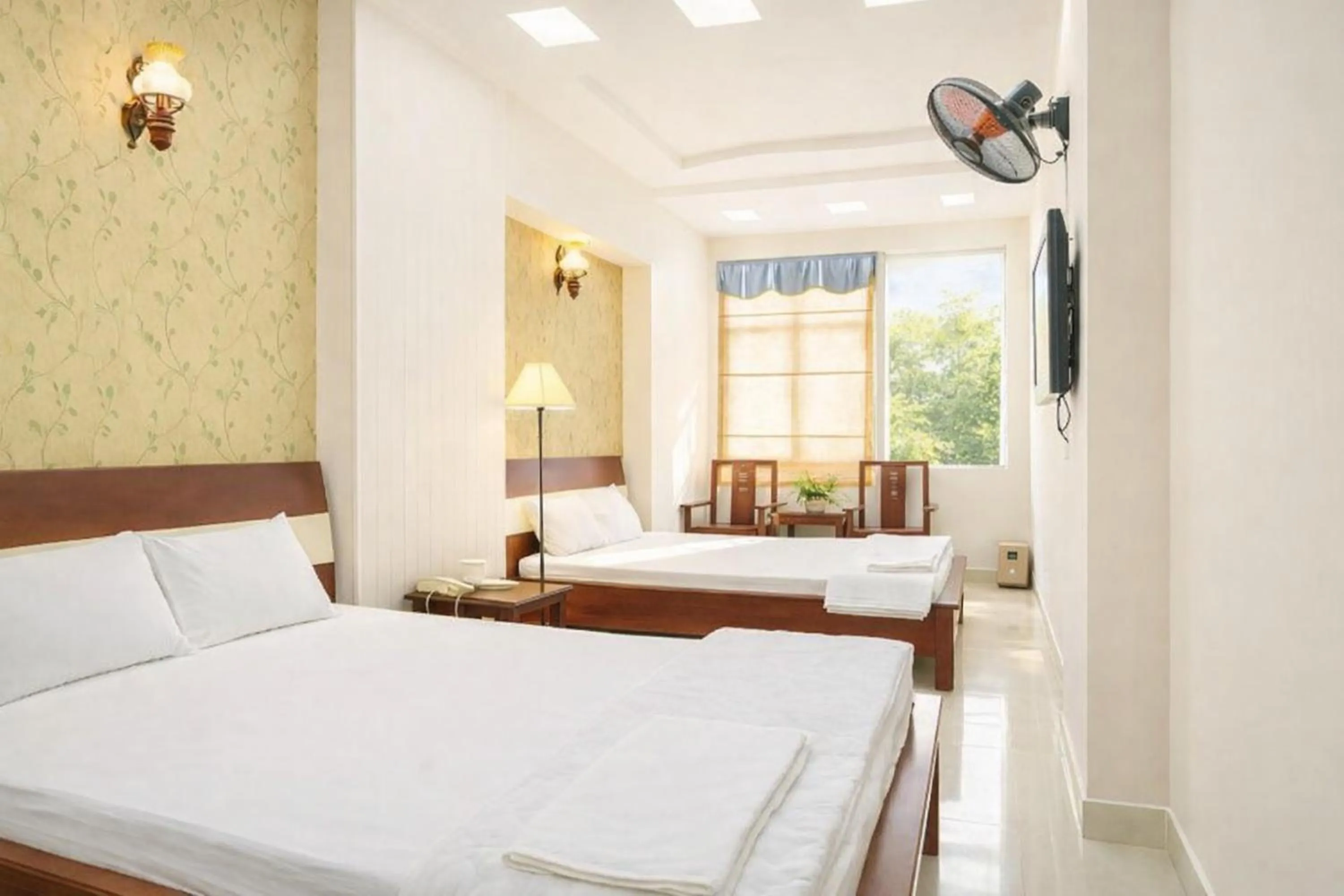 Bed in Quang Huy Hotel