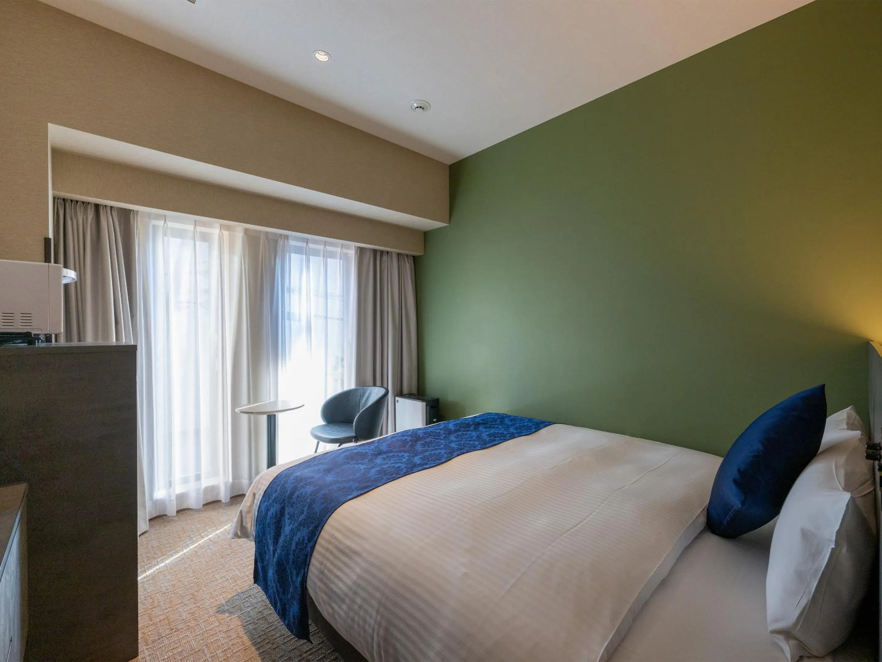 Bed in HOTEL R9 Premium Ichikawaekimae