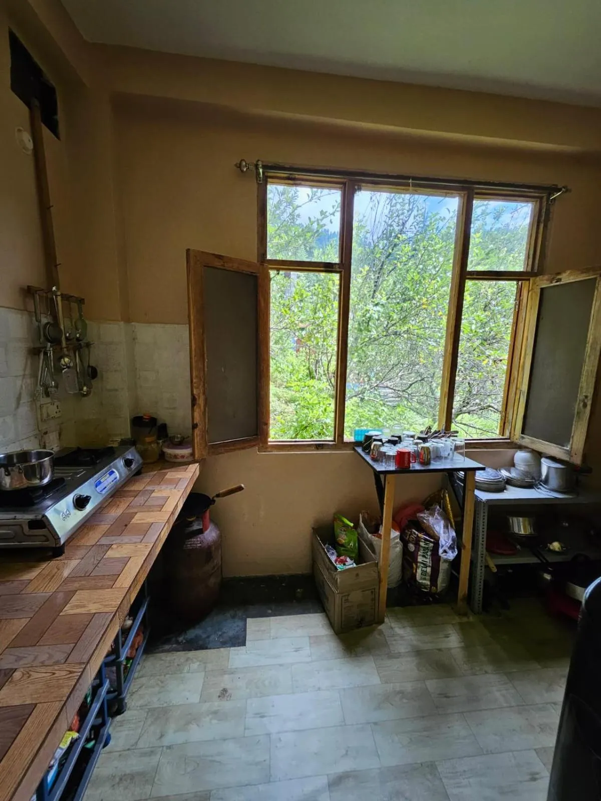 Kitchen or kitchenette in PREMALYA TRAILS By Tirtha