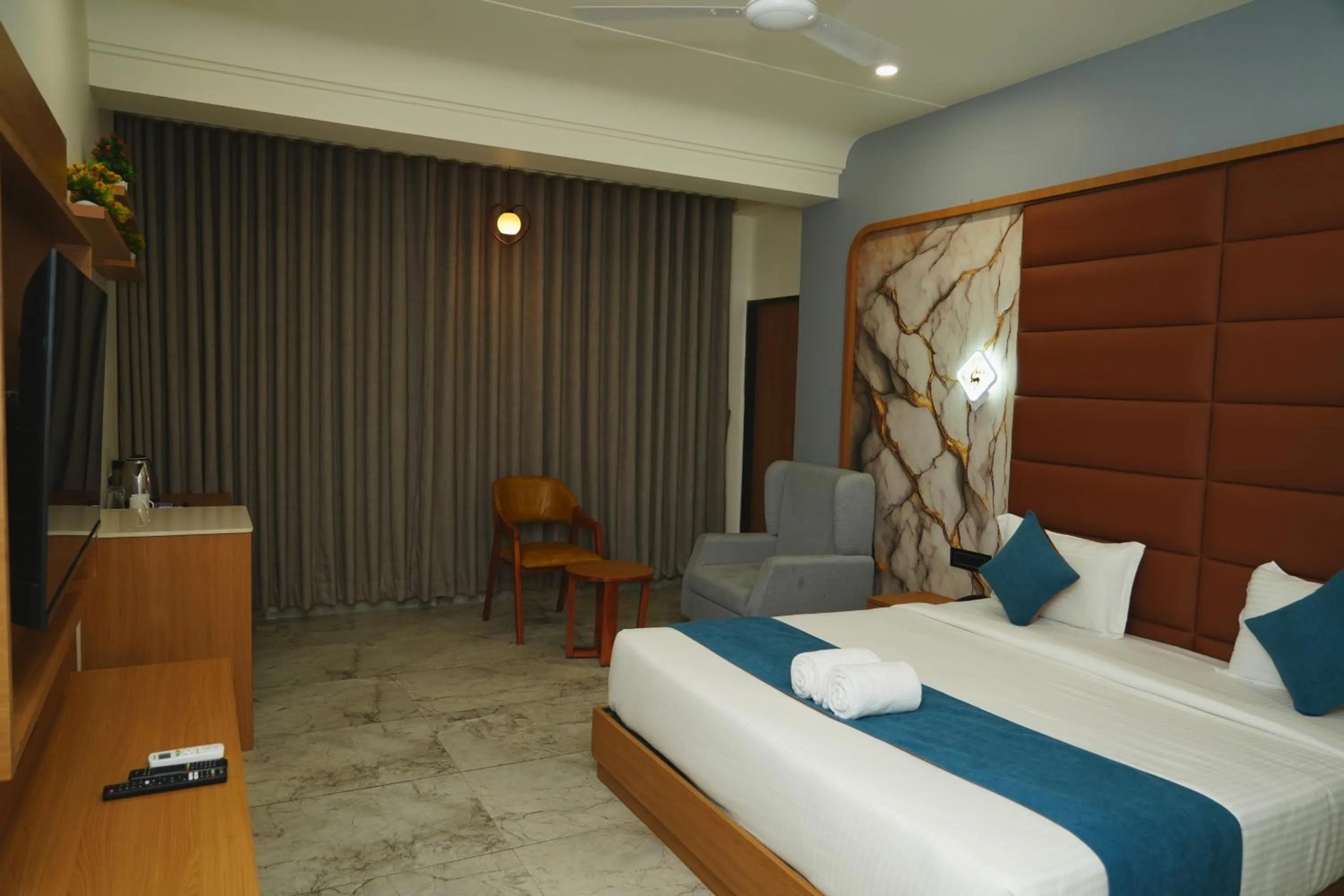 Photo of the whole room, Bed in Hotel Leela's