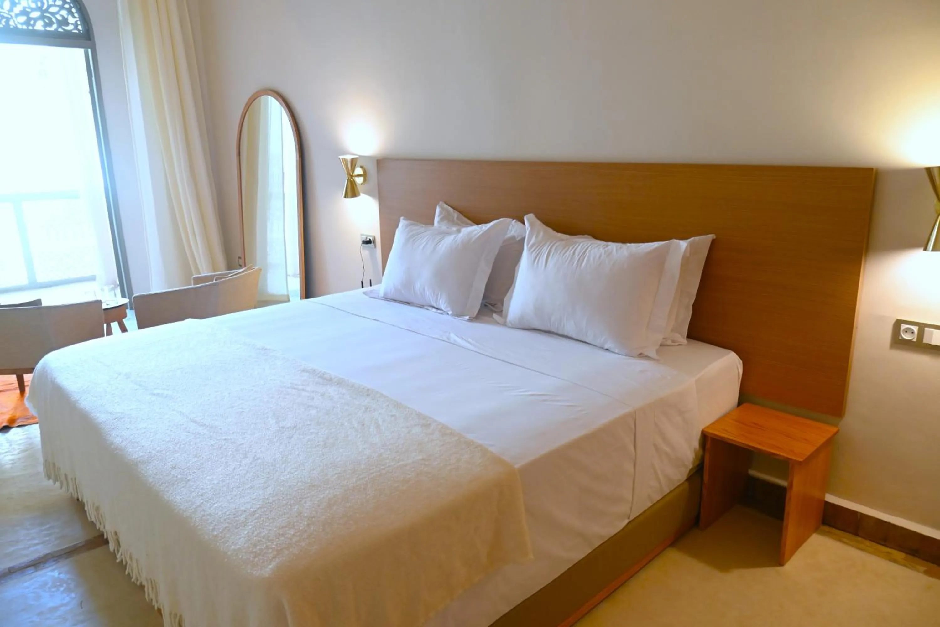 Bed in Riad Emberiza Sahari