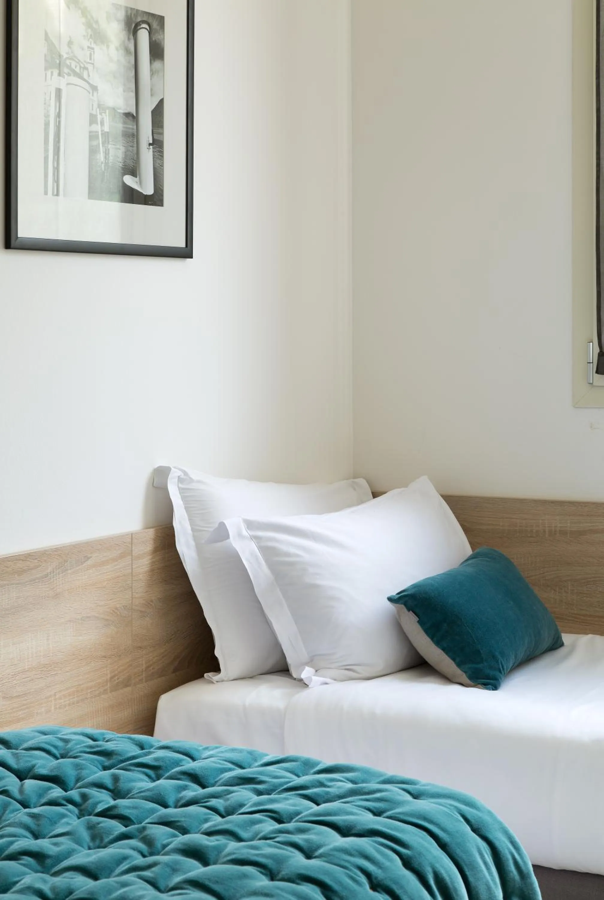 Bed in Filario Hotel & Residences