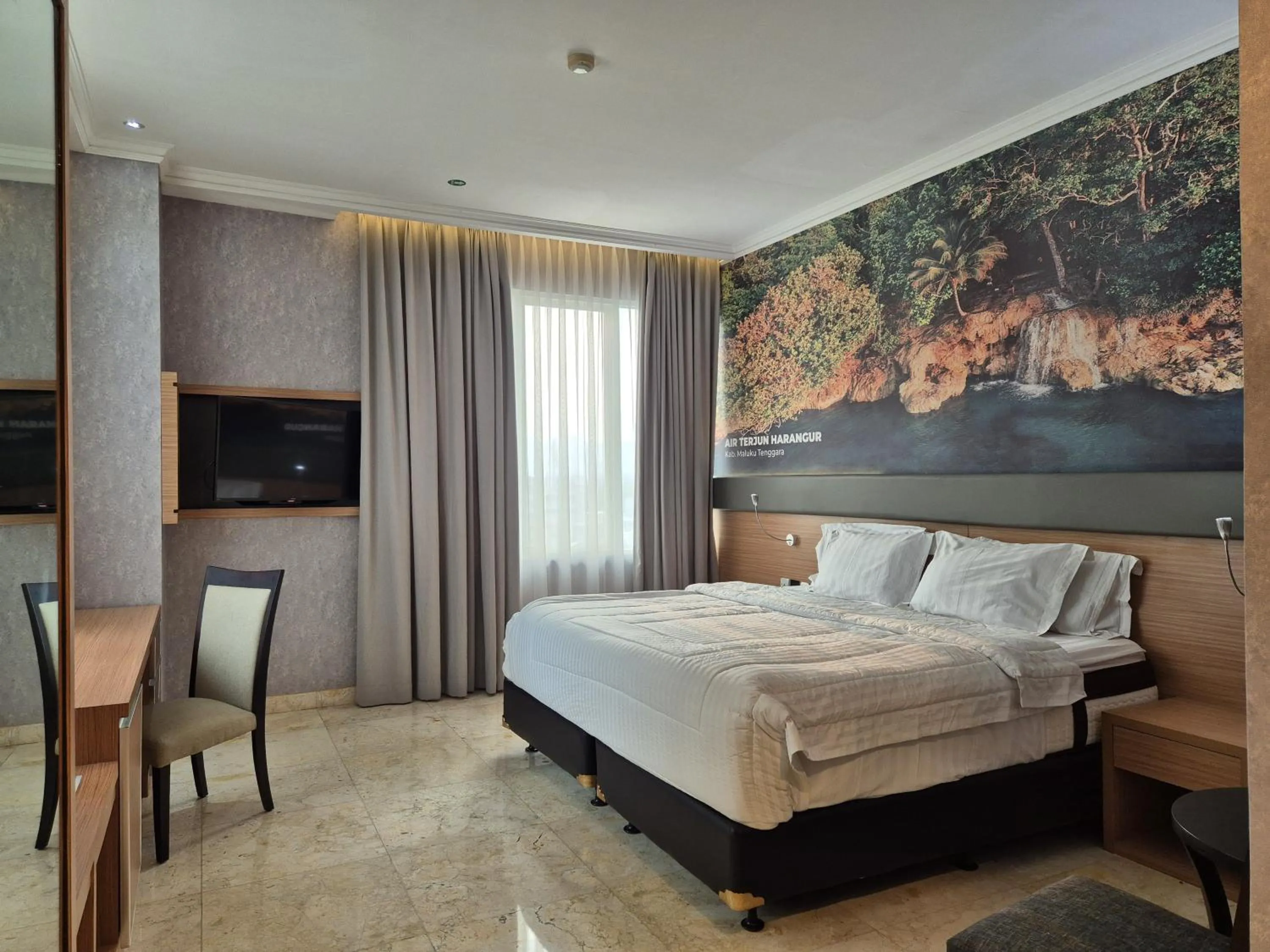 Photo of the whole room, Bed in GIIA Maluku Hotel Thamrin Jakarta