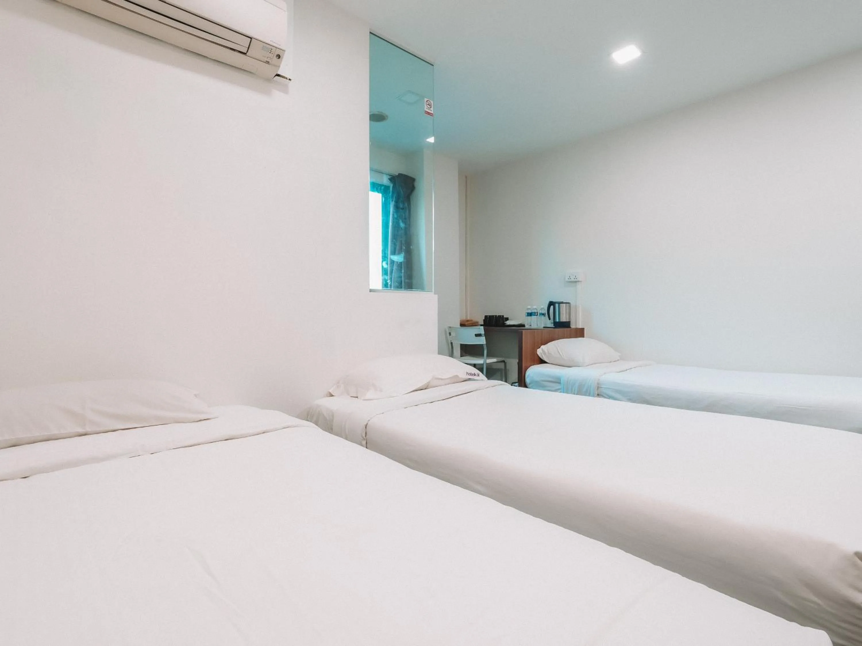 Bed in A Hotel Desker