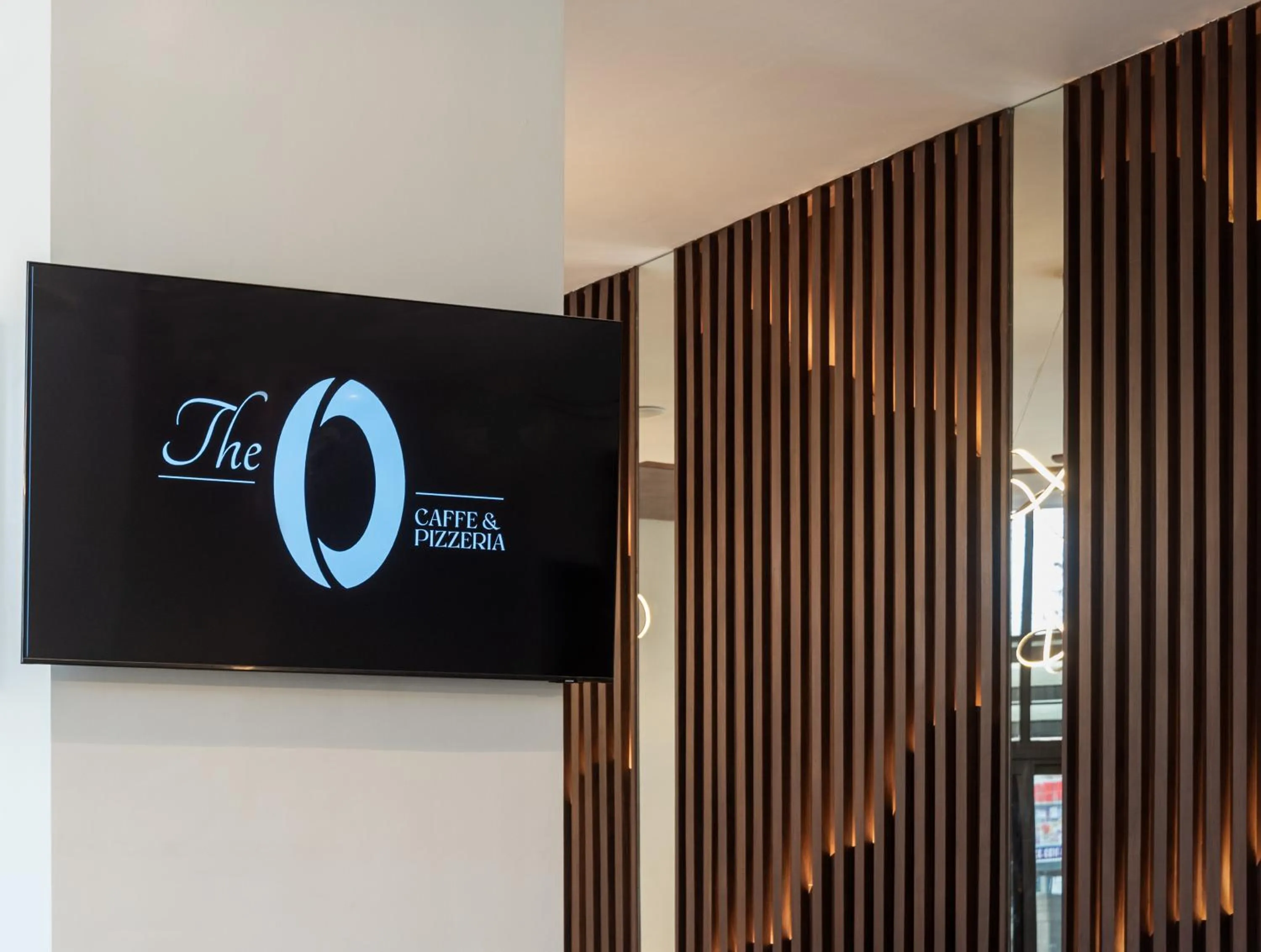 Property logo or sign in Okash City Boutique Hotel