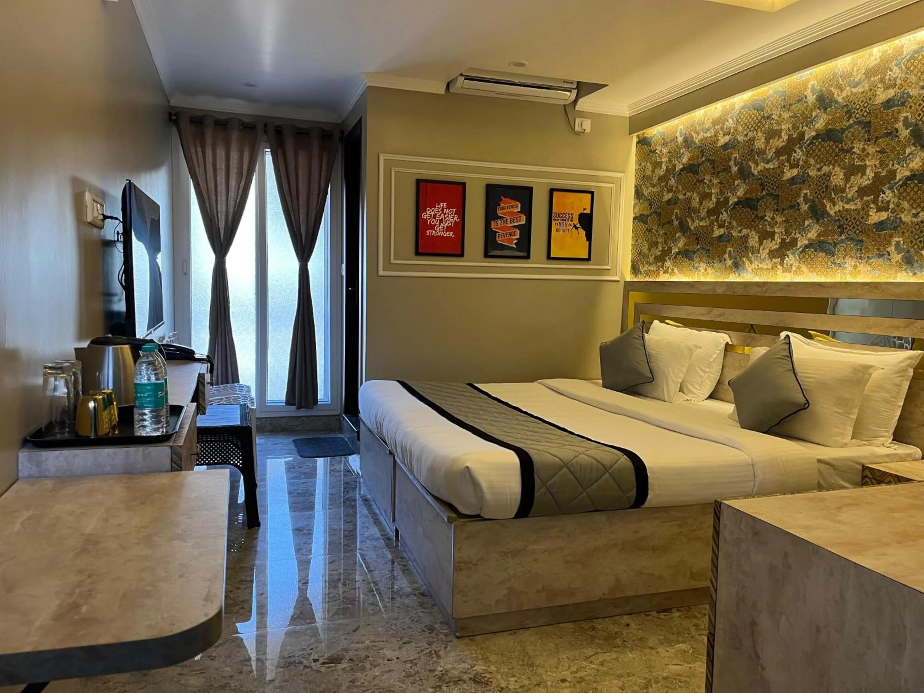 Photo of the whole room, Bed in LG Signature Suites Kalyan Nagar
