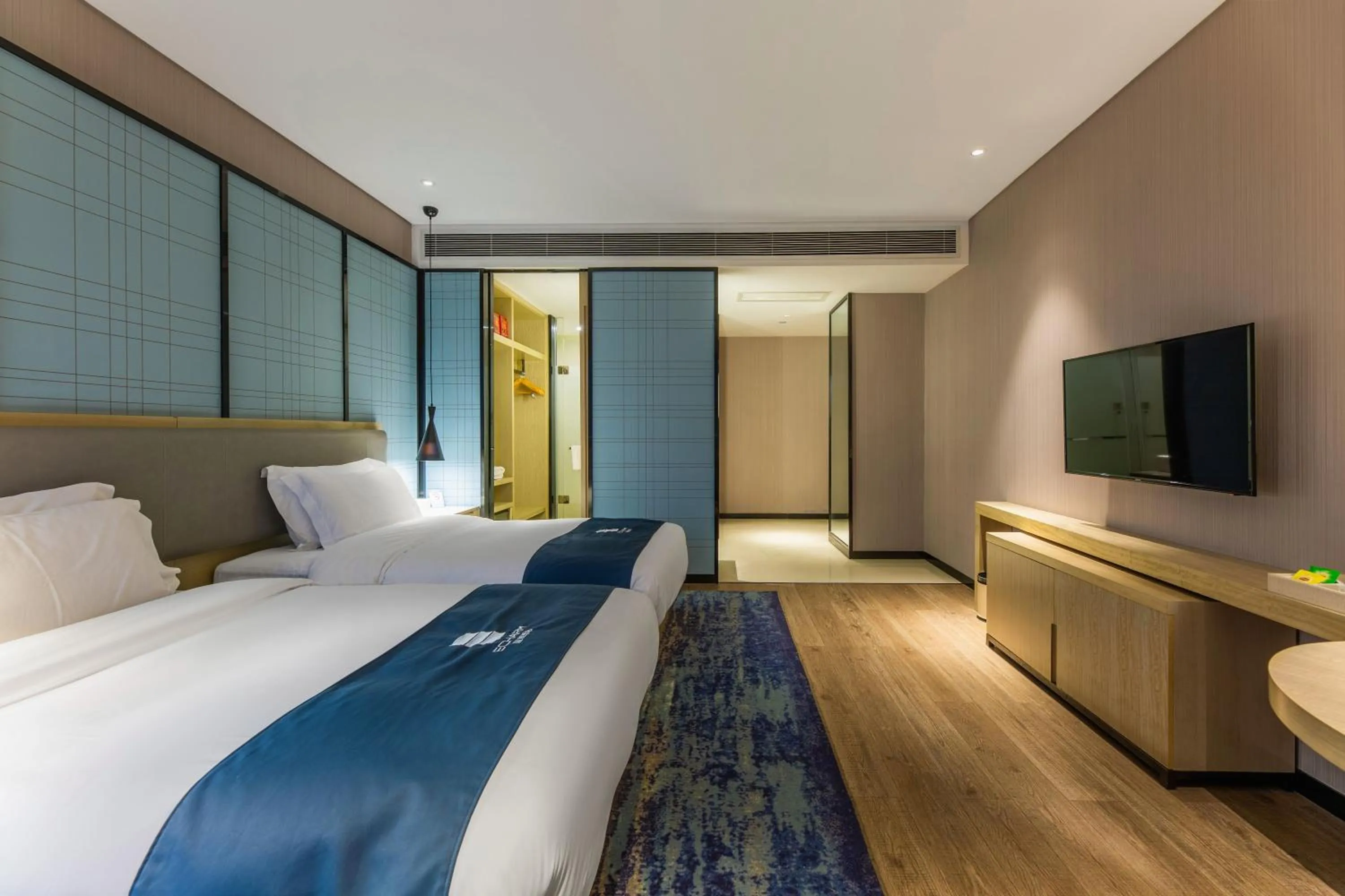 Bed in Echarm Hotel Wuhan Caidian Street Linzhang Avenue Metro Station