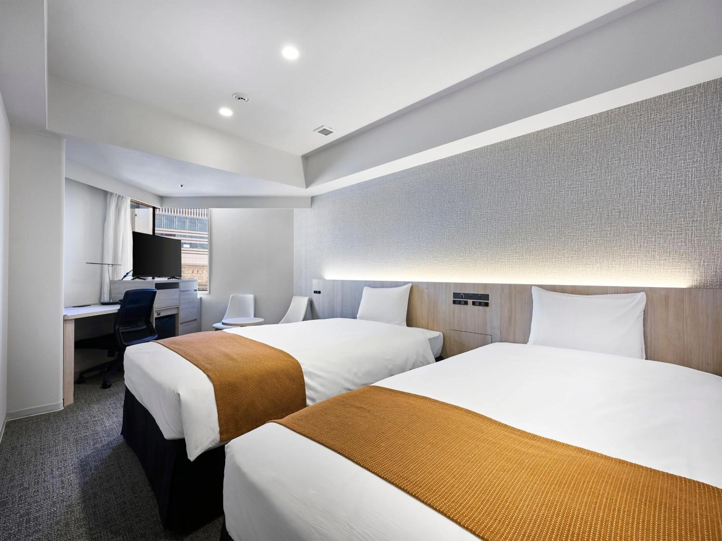 Bed in Daiwa Roynet Hotel Nagoya Shinkansenguchi