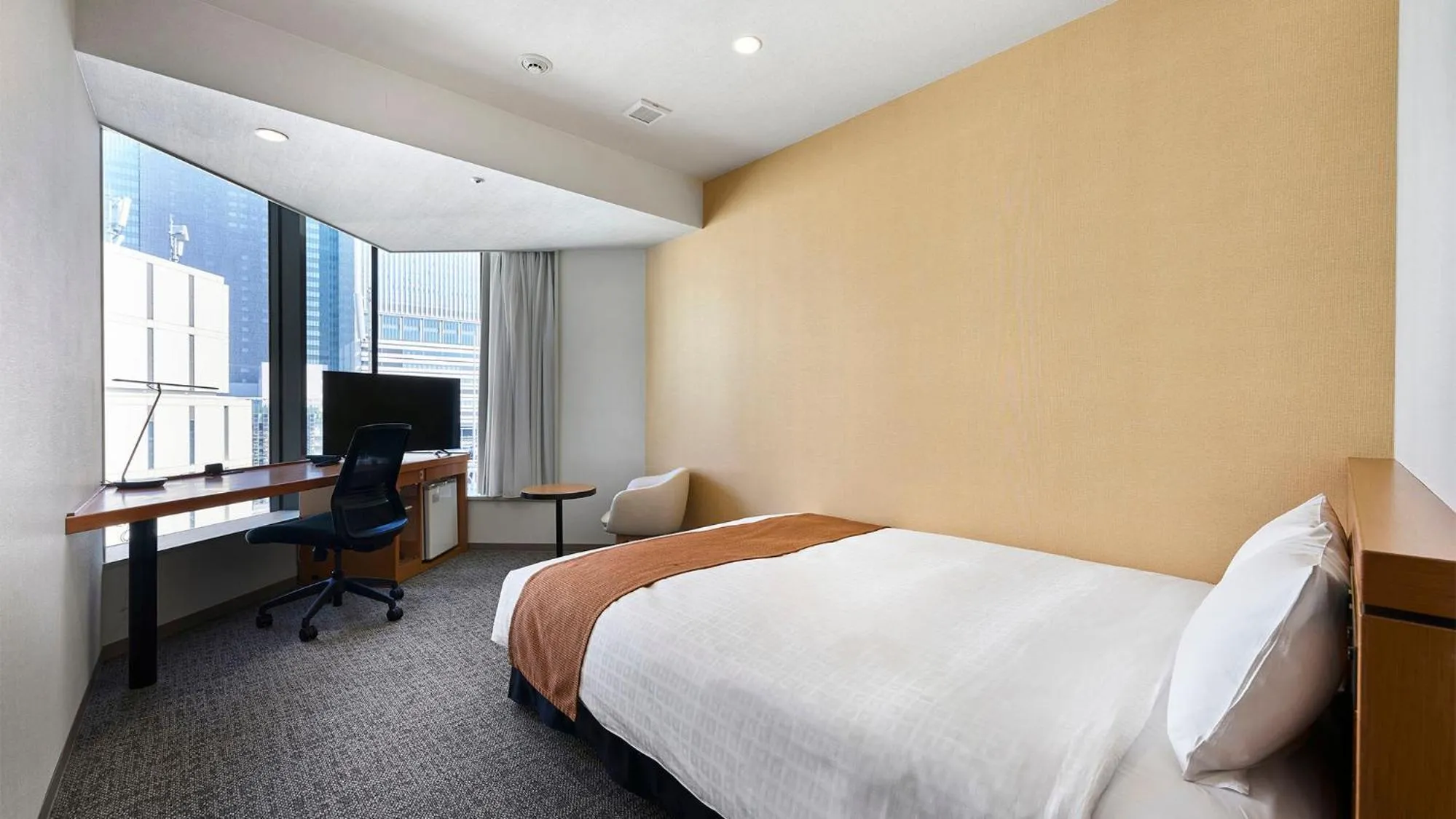 Bed in Daiwa Roynet Hotel Nagoya Shinkansenguchi