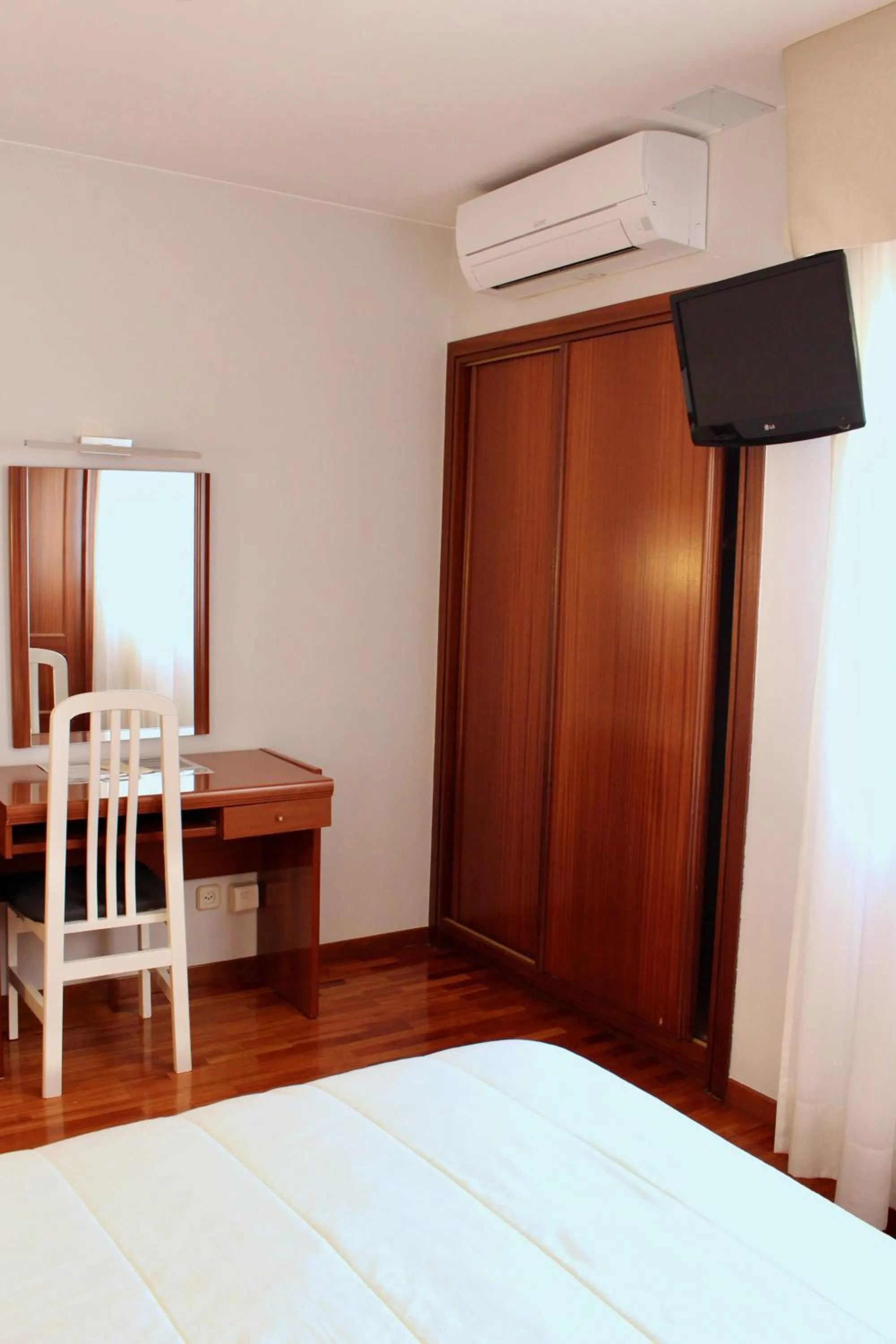 Seating area, Bed in Hotel As Camelias