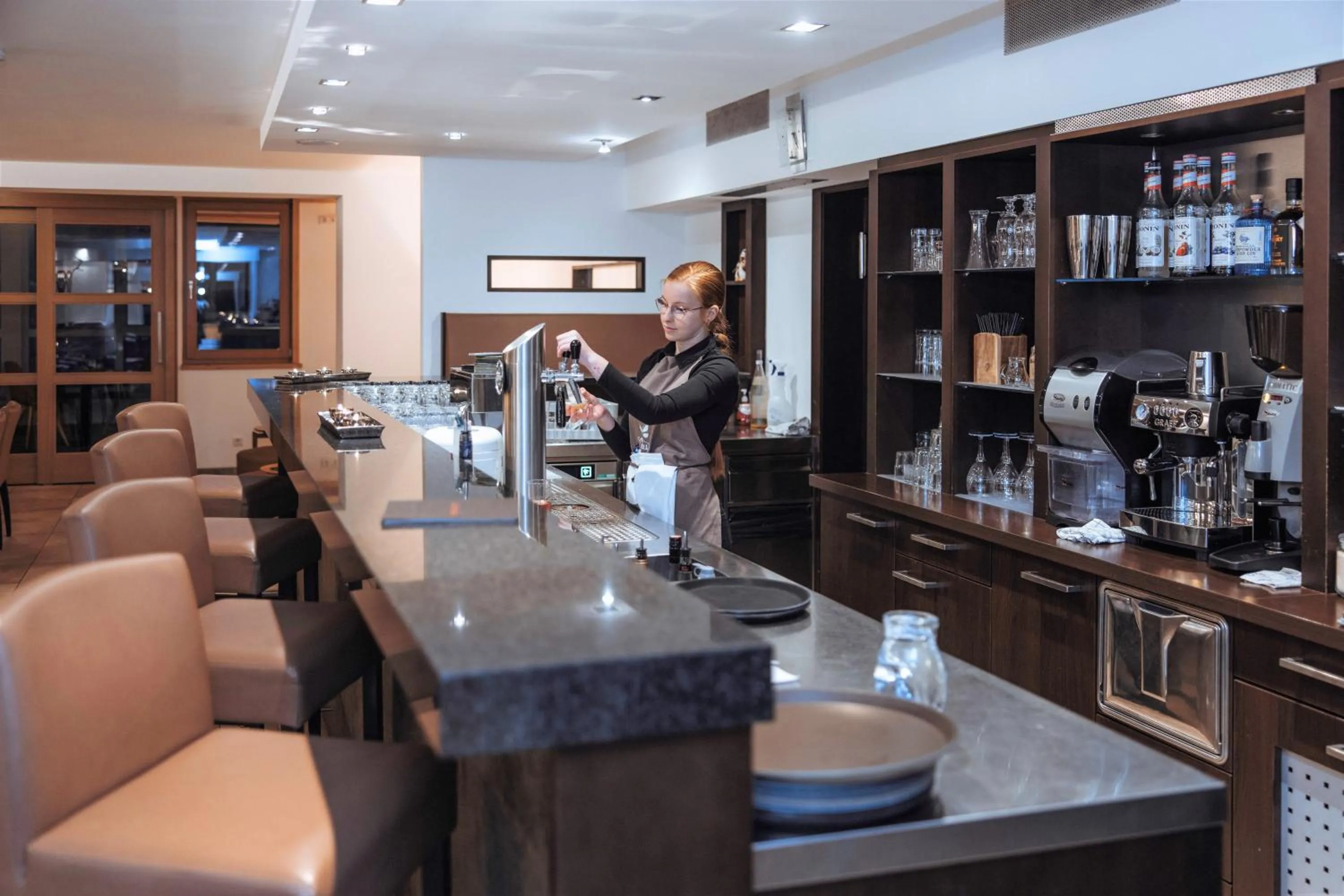 Lounge or bar in nawu apartments & Restaurant