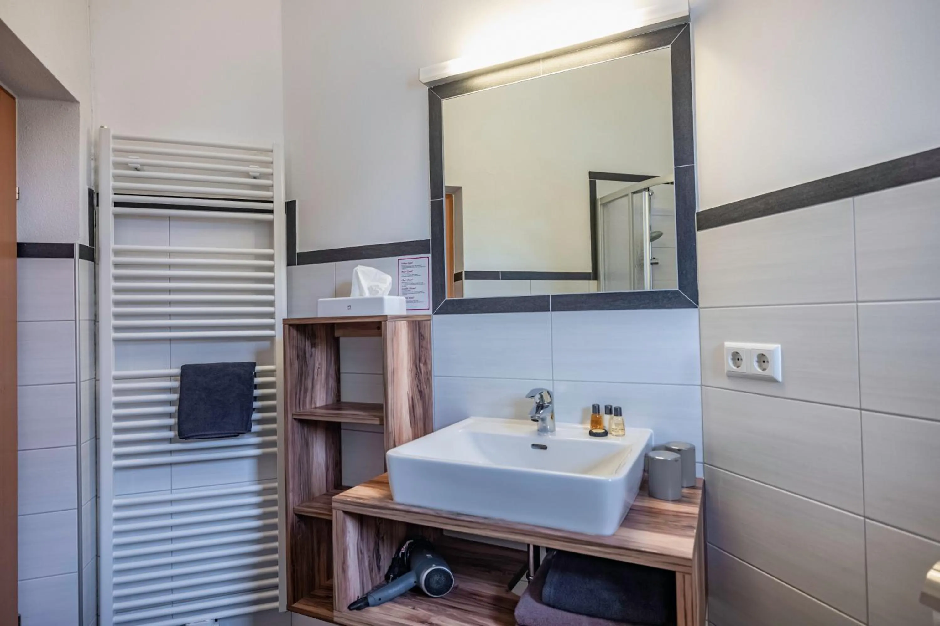 Bathroom in nawu apartments & Restaurant