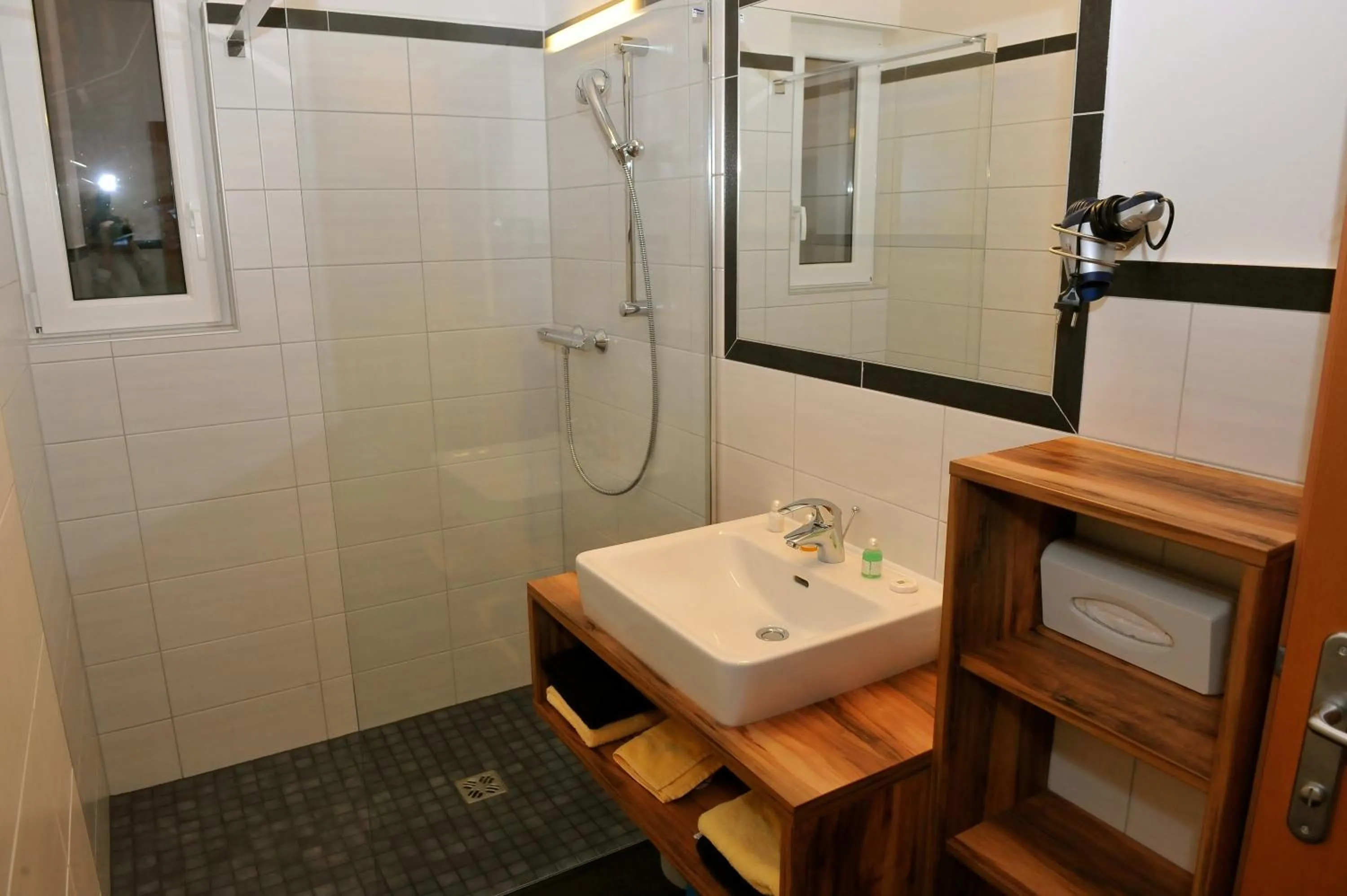 Bathroom in nawu apartments & Restaurant