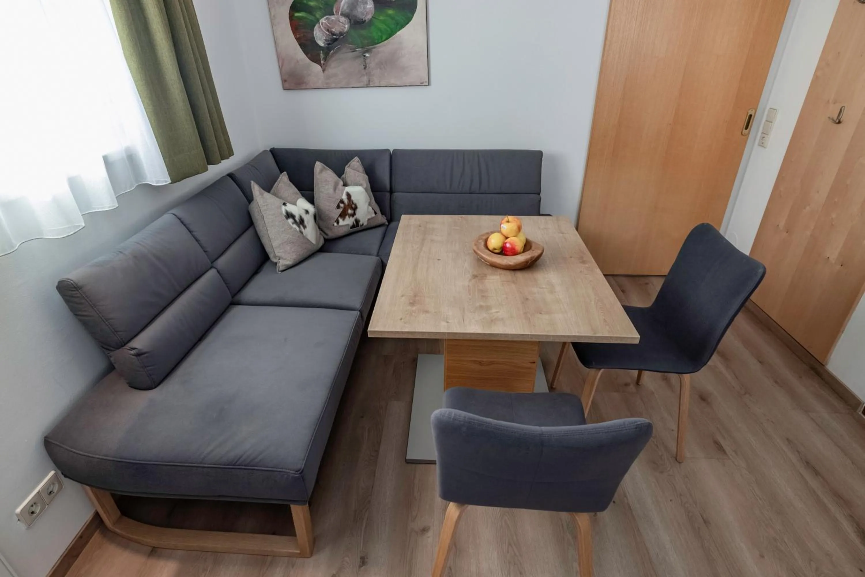 Seating area in nawu apartments & Restaurant