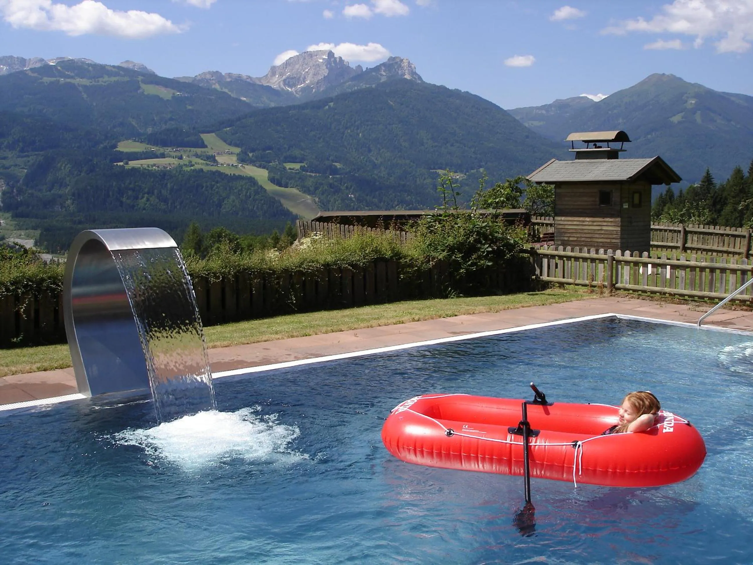 Swimming pool in nawu apartments & Restaurant