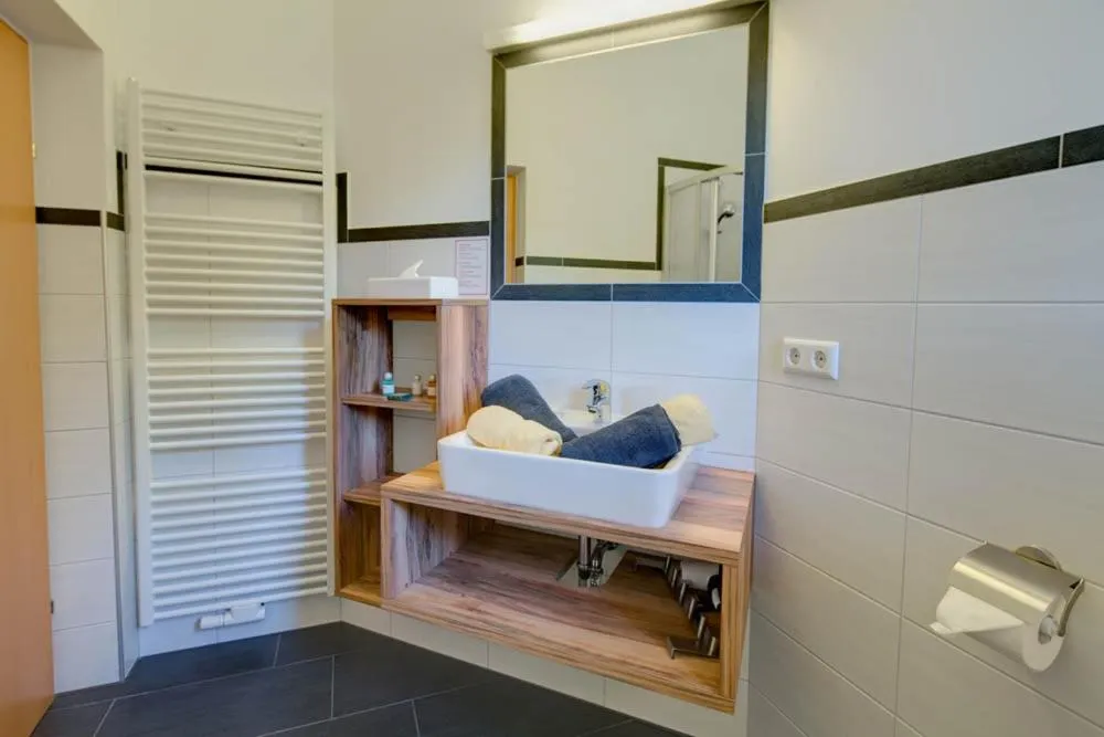 Bathroom in nawu apartments & Restaurant