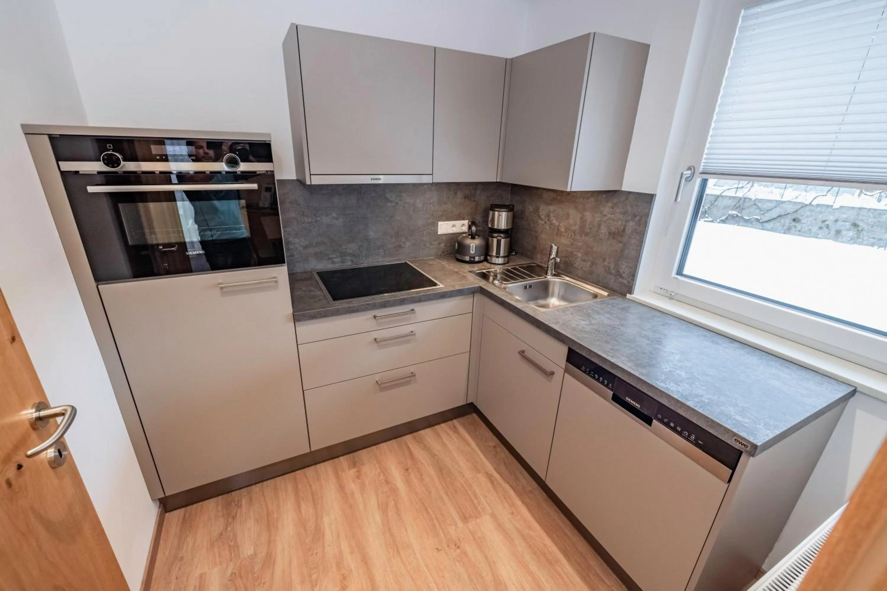 kitchen in nawu apartments & Restaurant