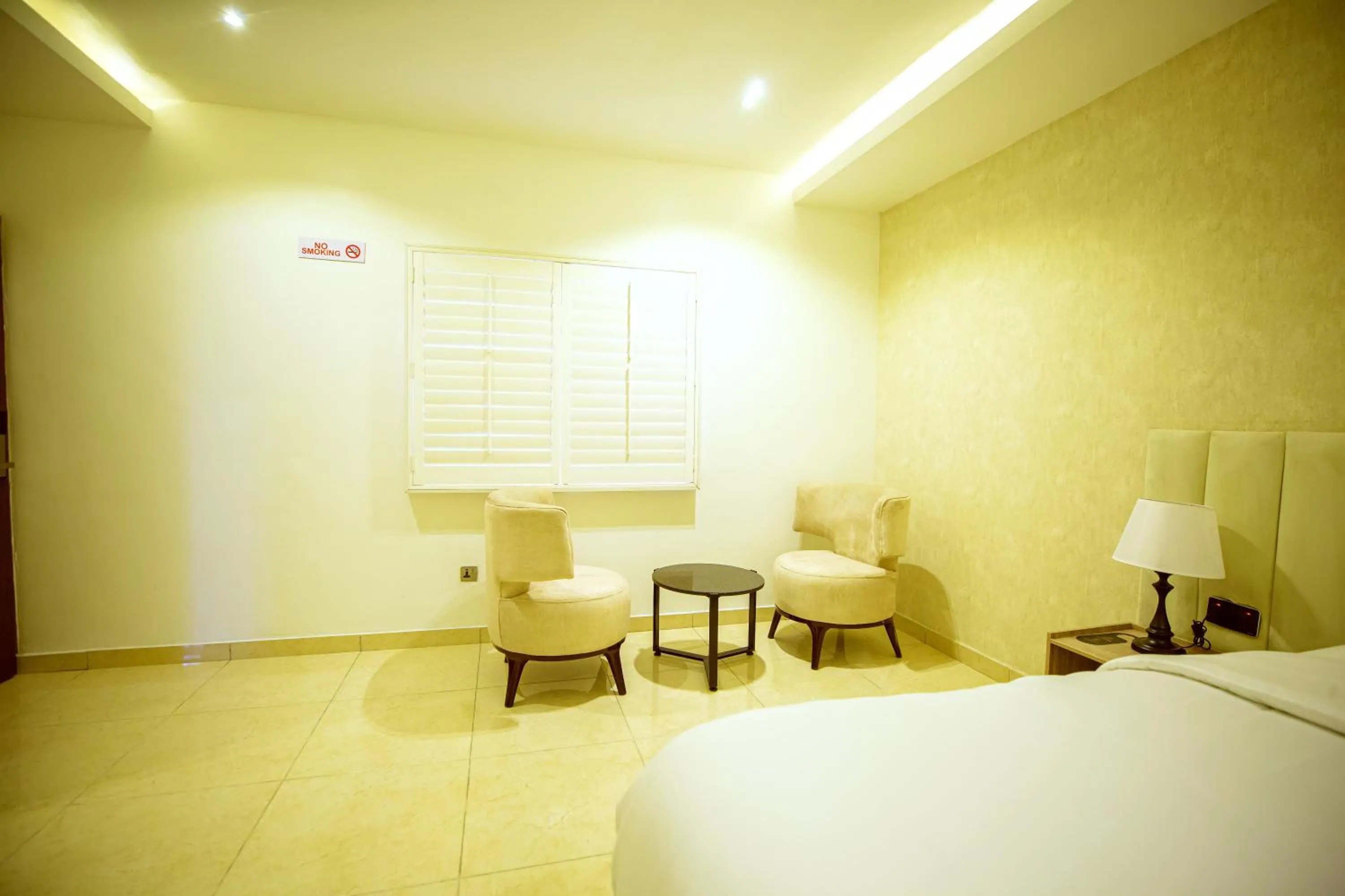 Bed in Tranquil Oasis Hotel