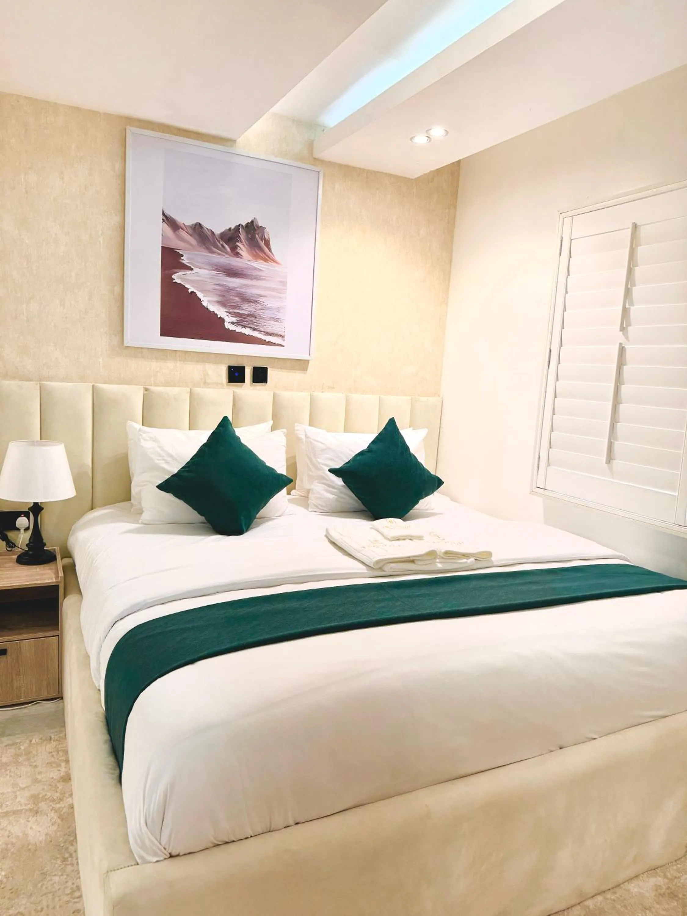 Bed in Tranquil Oasis Hotel