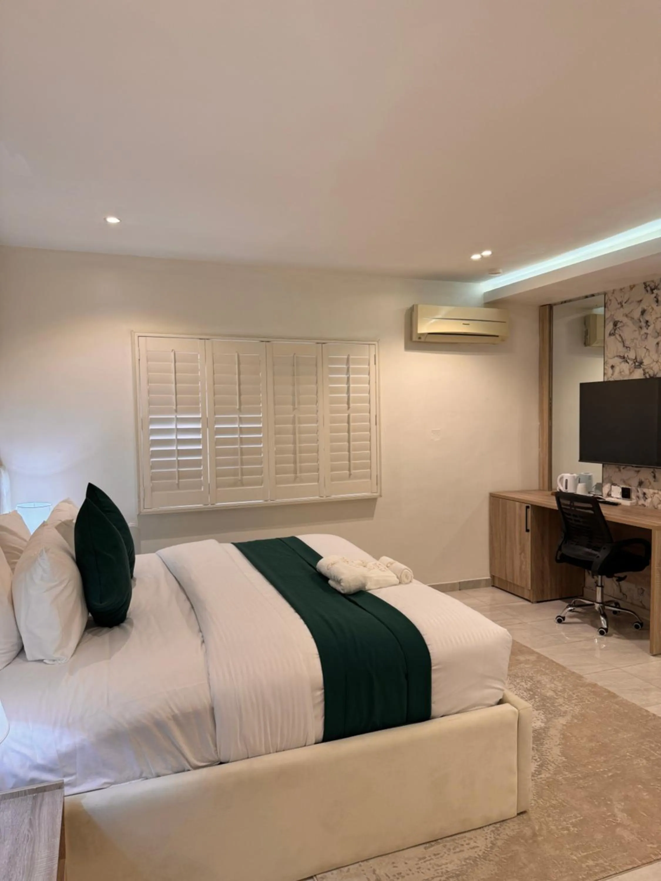 Bed in Tranquil Oasis Hotel