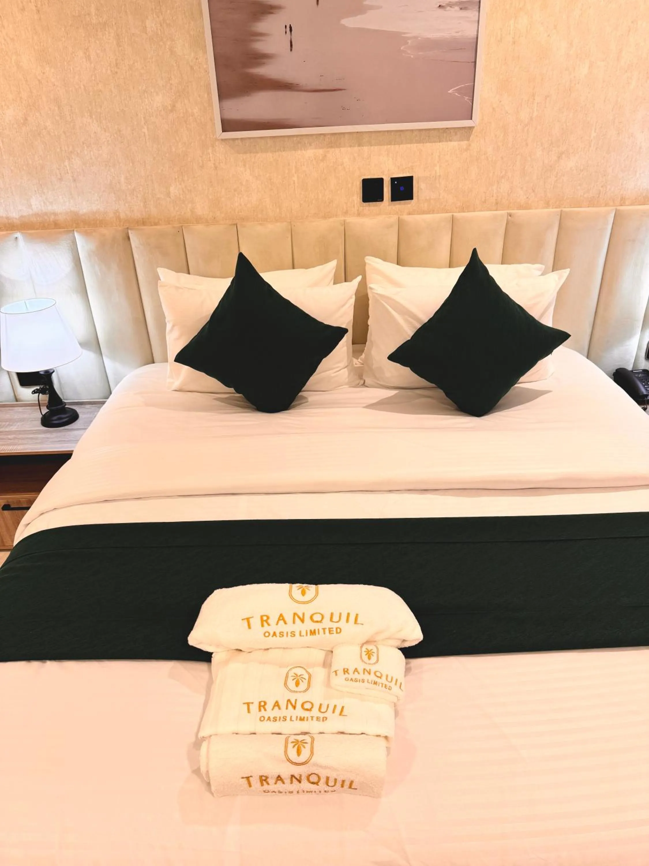 Bed in Tranquil Oasis Hotel