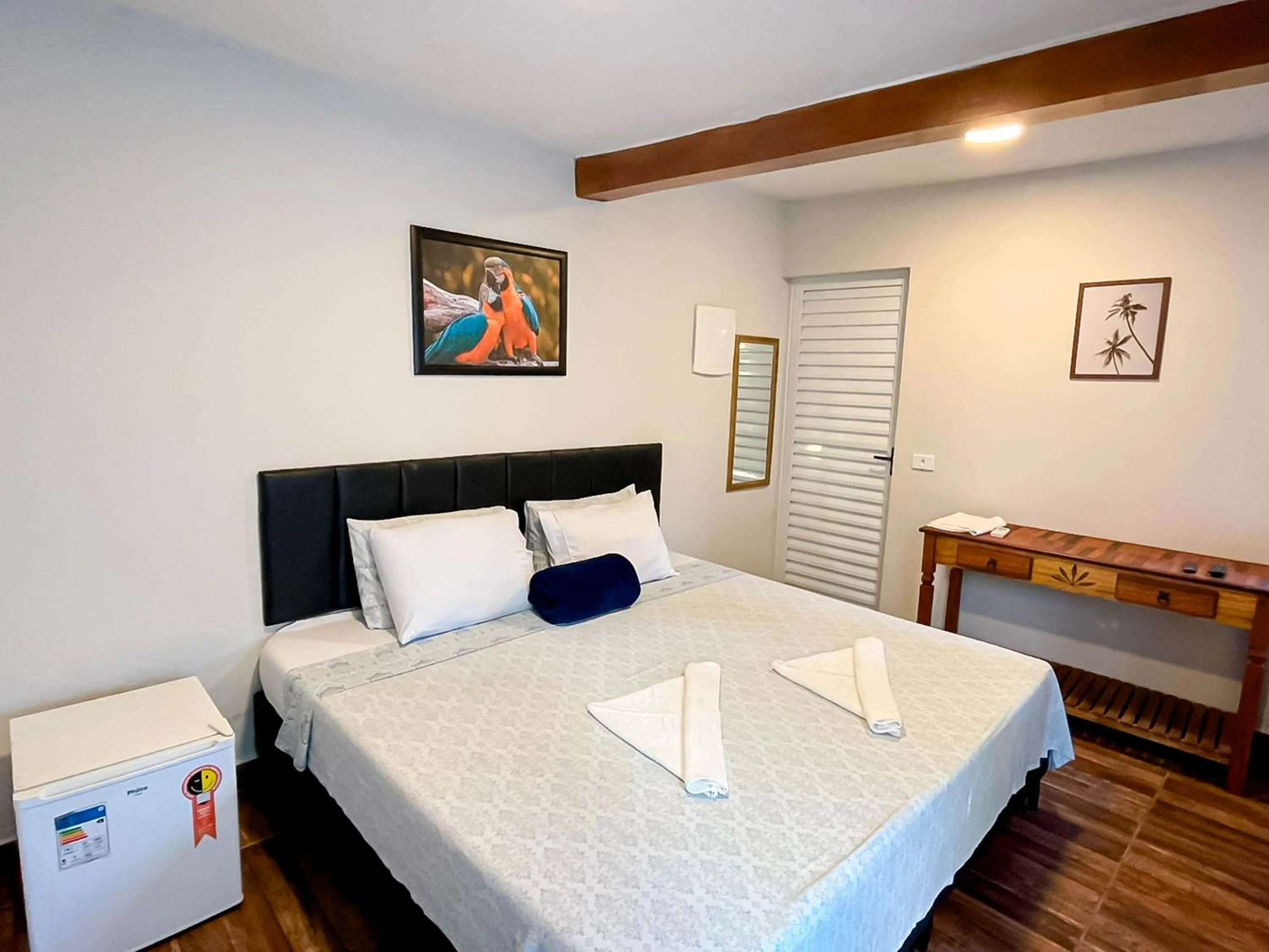 Bed in VELINN Pousada Praia do Perequê