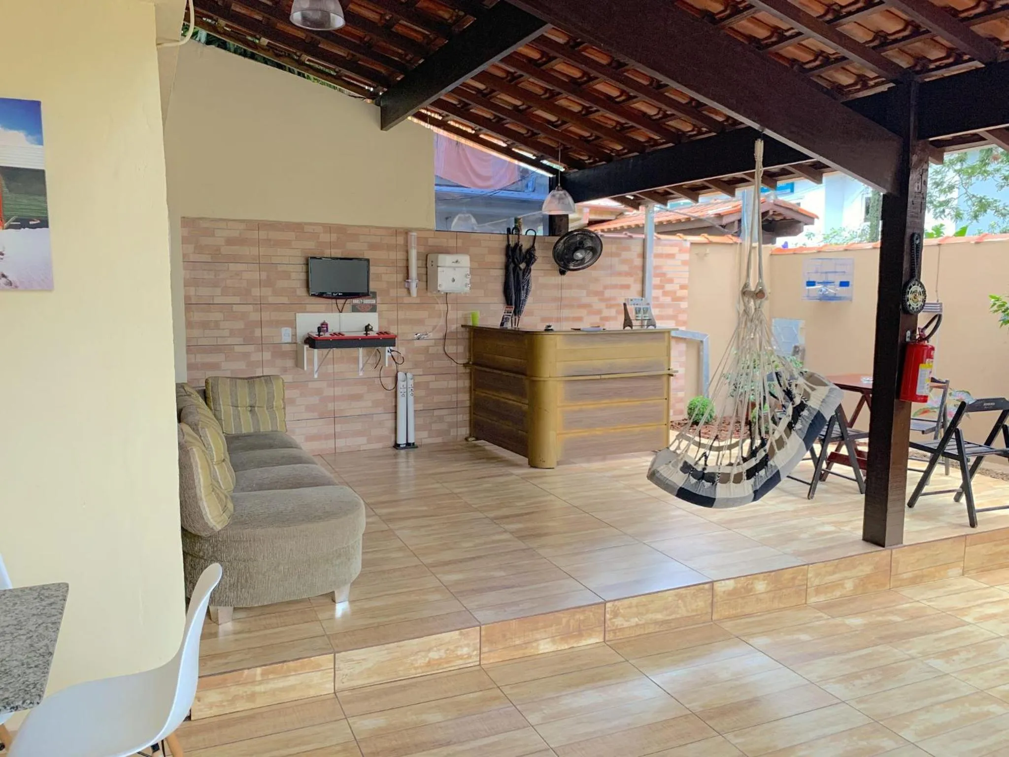 Lobby or reception in VELINN Pousada Praia do Perequê