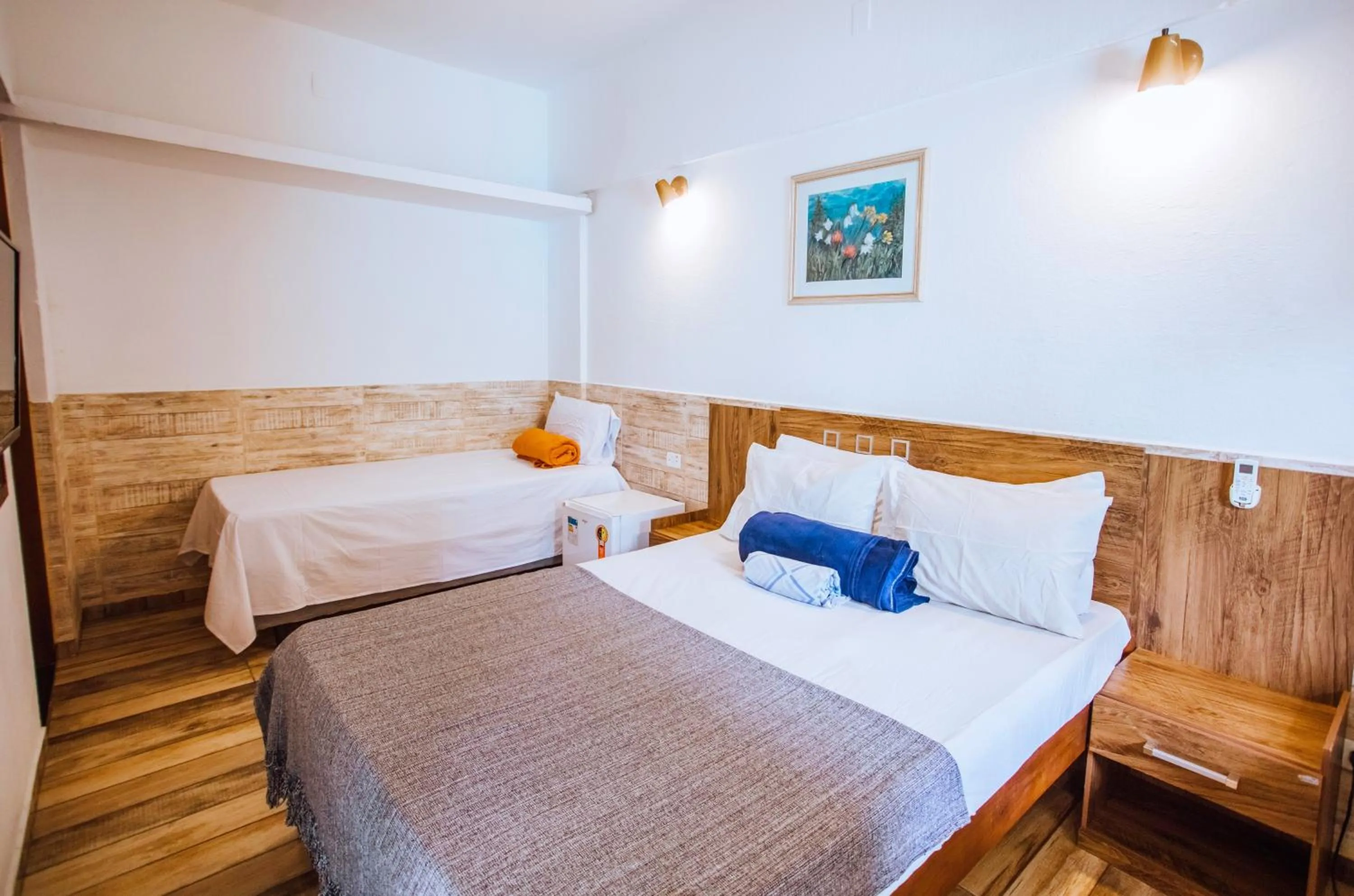 Bed in VELINN Pousada Praia do Perequê