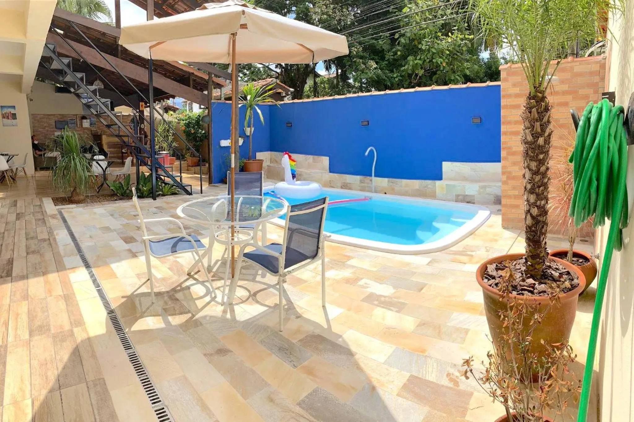 Swimming pool in VELINN Pousada Praia do Perequê