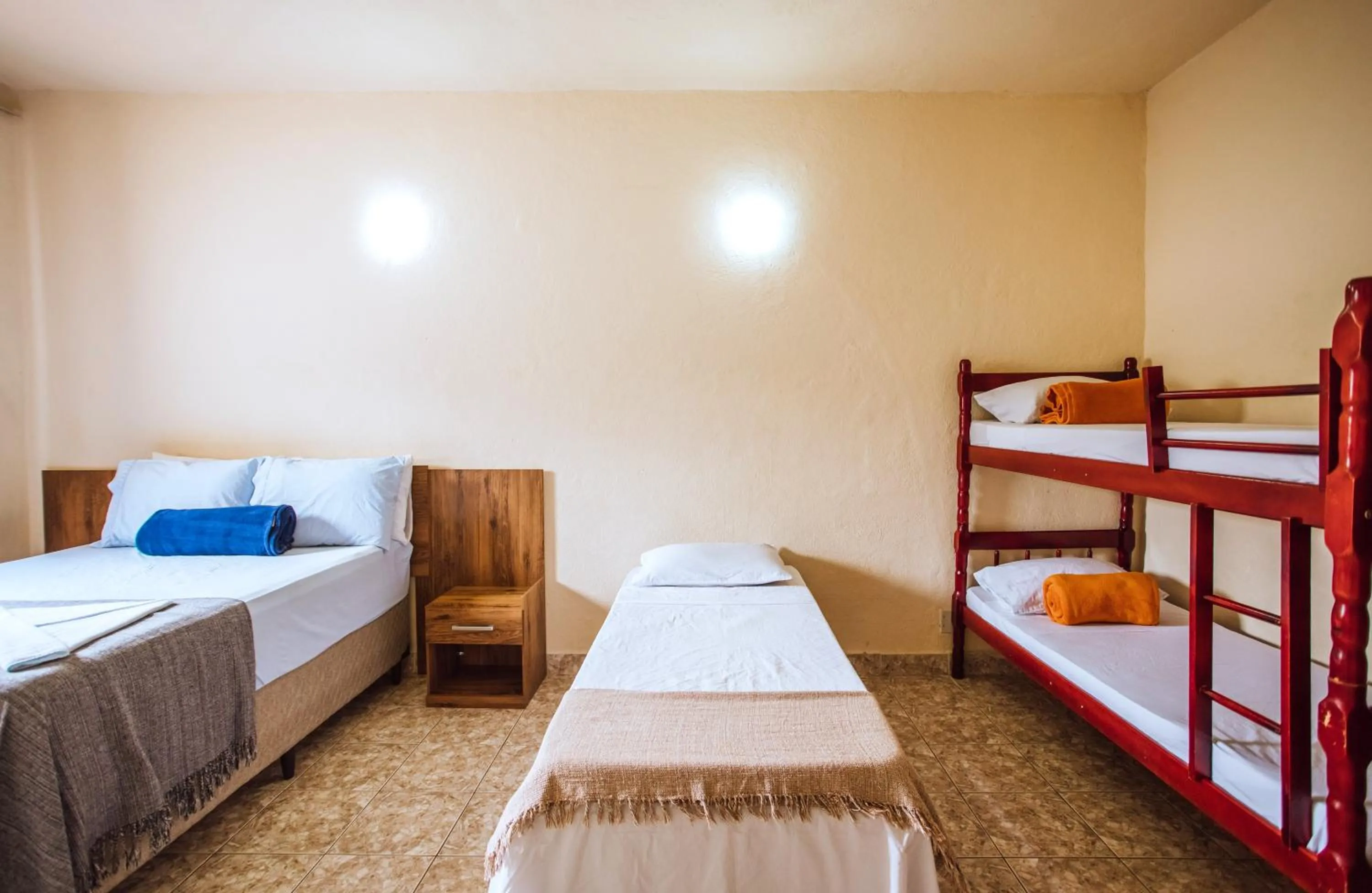 Bed in VELINN Pousada Praia do Perequê