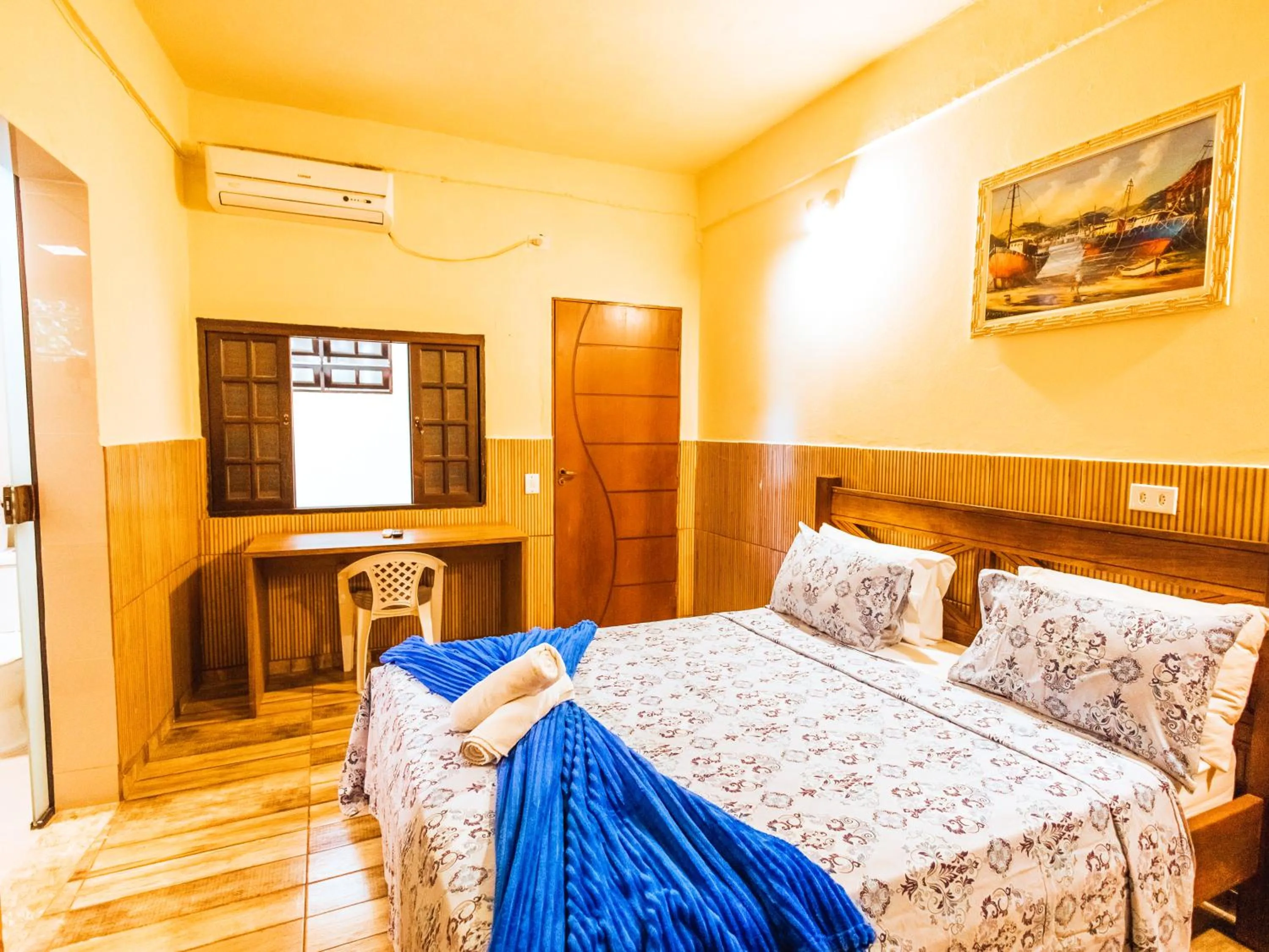 Bed in VELINN Pousada Praia do Perequê