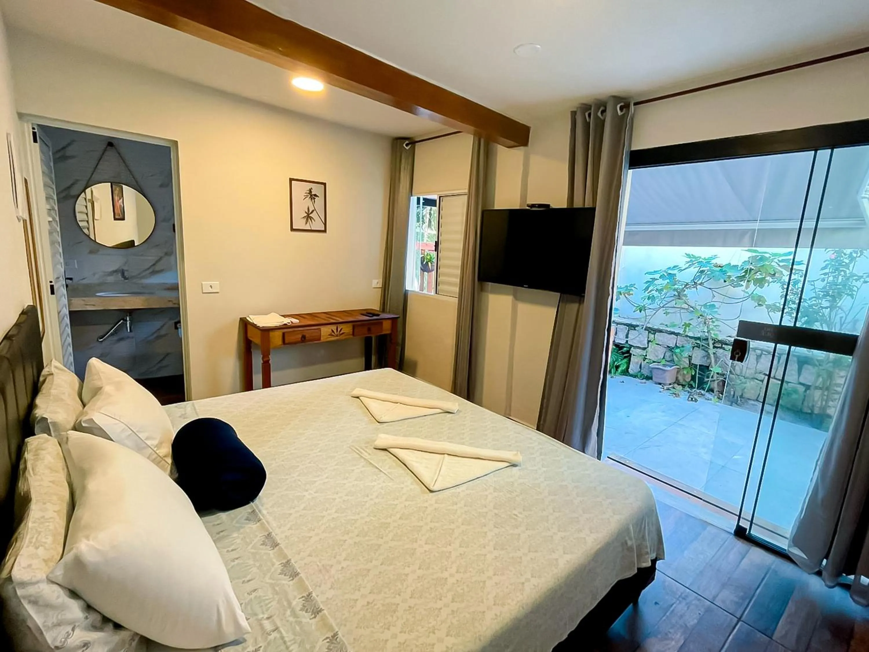 Bed in VELINN Pousada Praia do Perequê