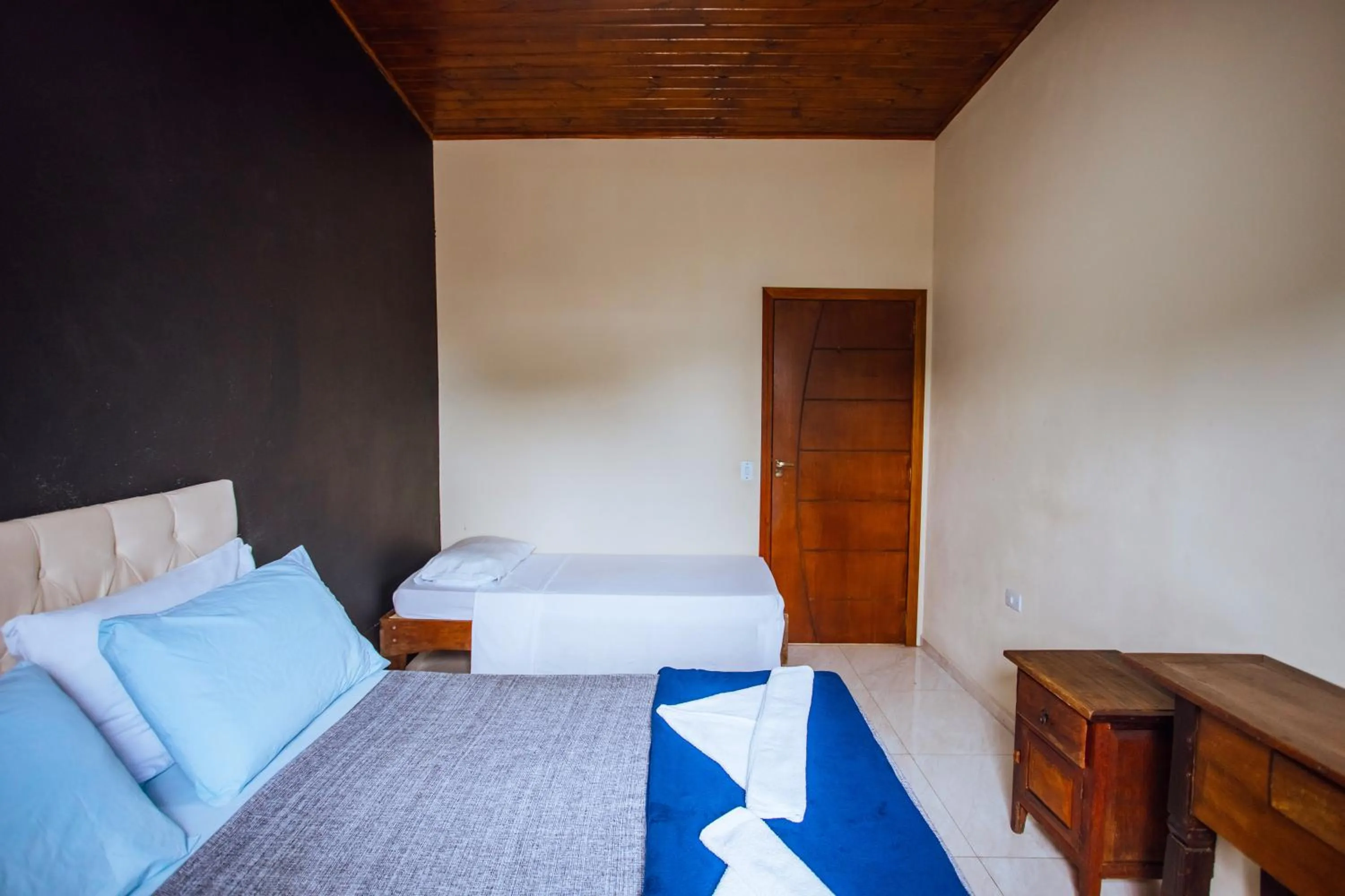 Bed in VELINN Pousada Praia do Perequê