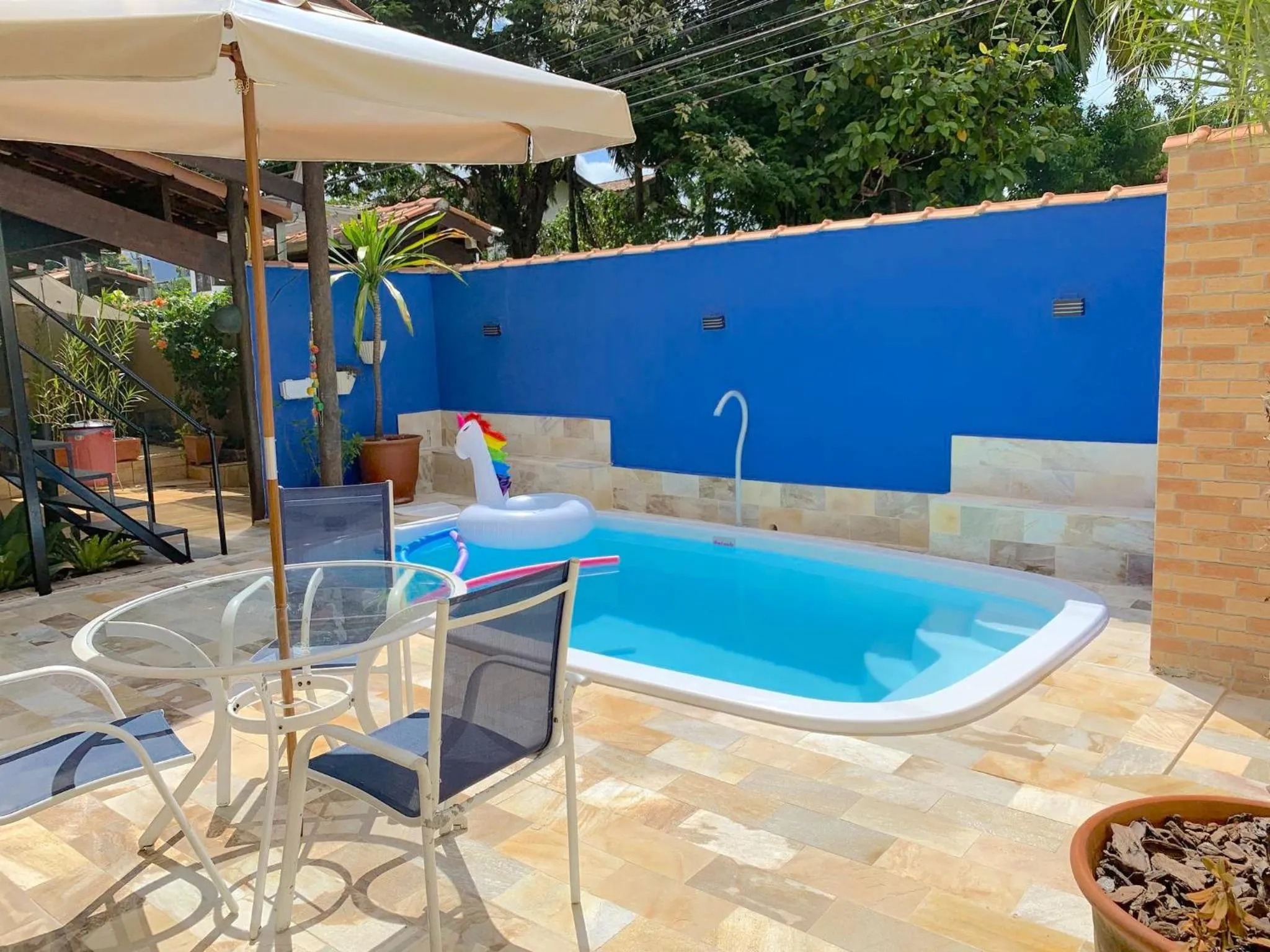 Swimming pool in VELINN Pousada Praia do Perequê