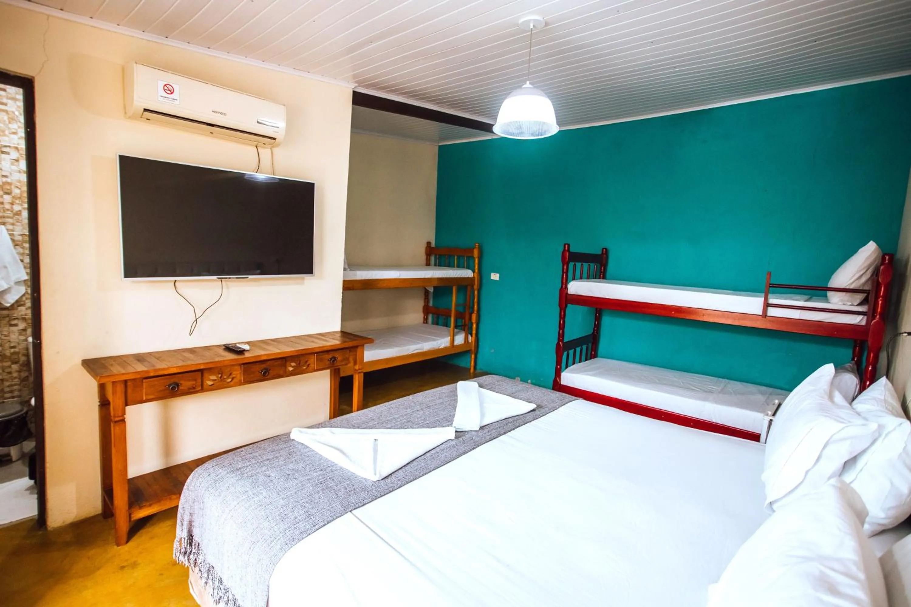 Bed in VELINN Pousada Praia do Perequê