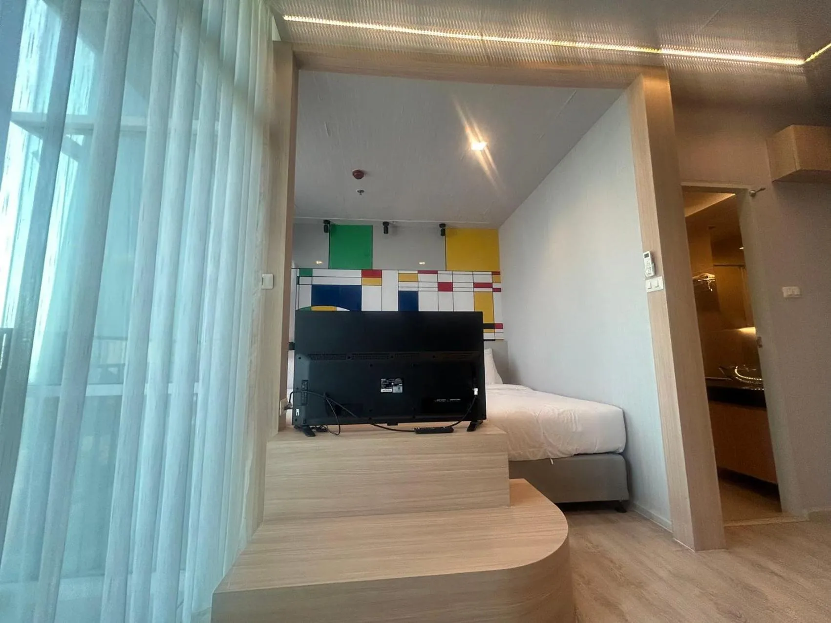 Living room, Bed in The Grand Jomtien Condo