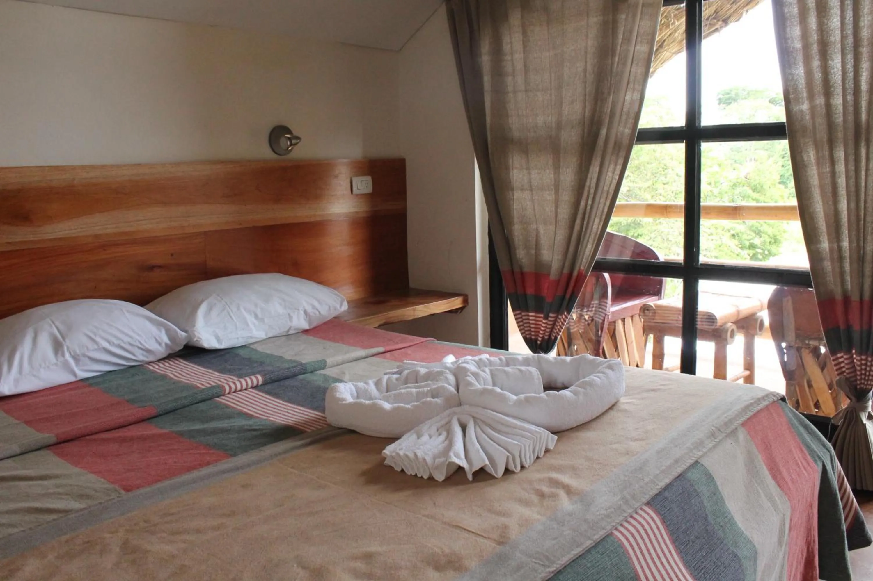 Bedroom, Bed in AXKAN PALENQUE, ALBERCAS, GASTRONOMIA MAR y TIERRA & TRAVEL AGENCY