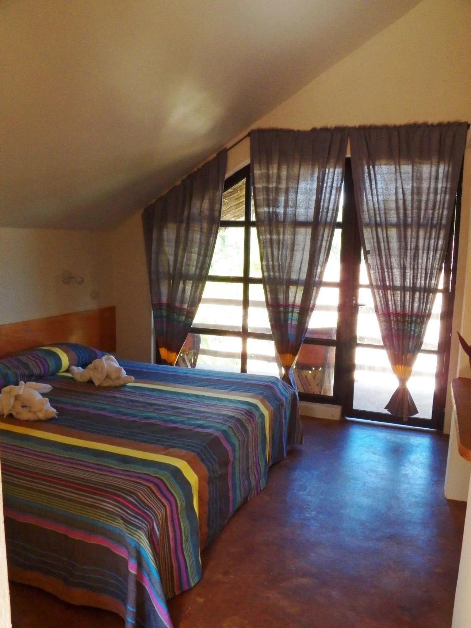 Photo of the whole room, Bed in AXKAN PALENQUE, ALBERCAS, GASTRONOMIA MAR y TIERRA & TRAVEL AGENCY