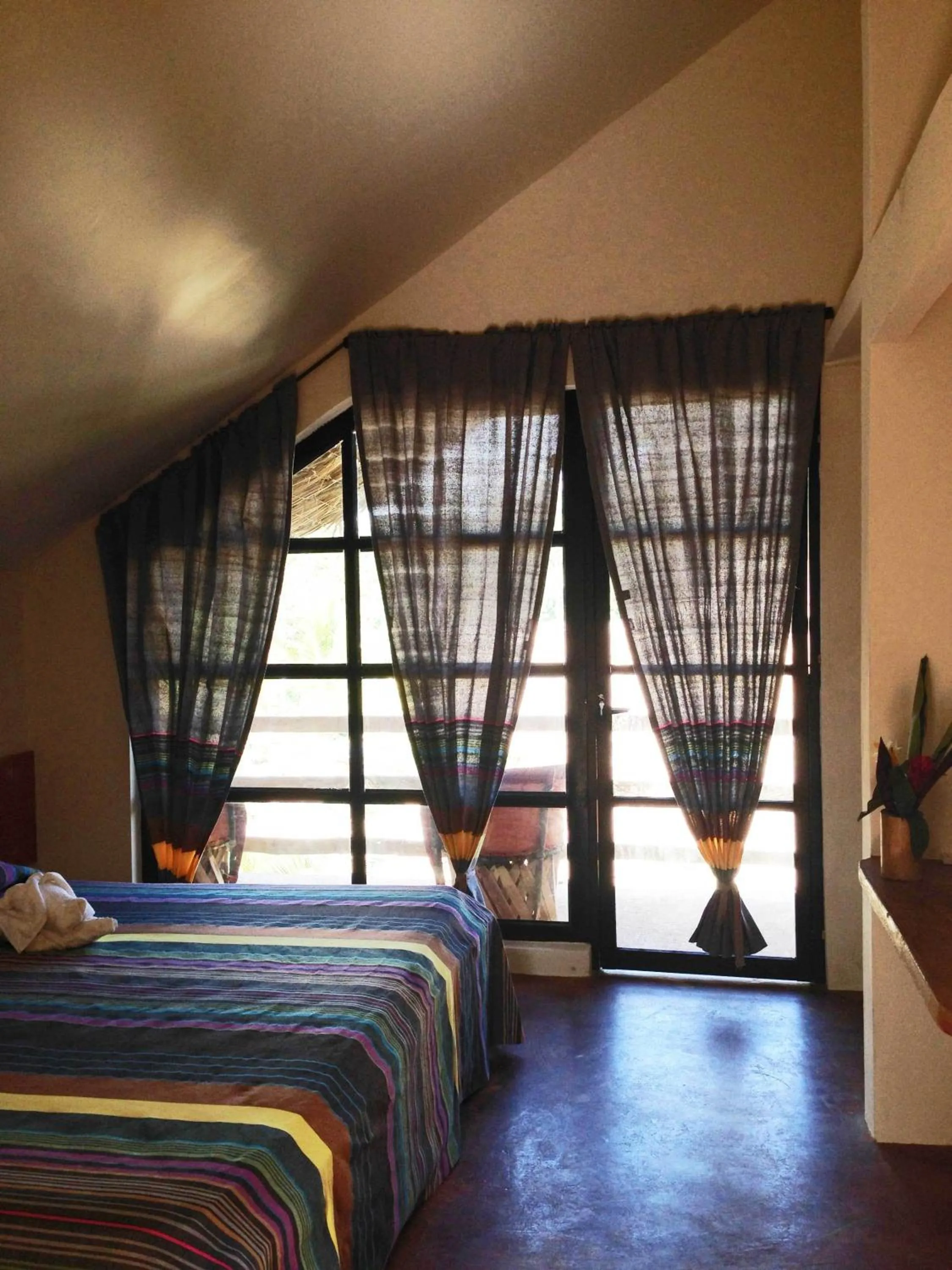 Photo of the whole room, Bed in AXKAN PALENQUE, ALBERCAS, GASTRONOMIA MAR y TIERRA & TRAVEL AGENCY