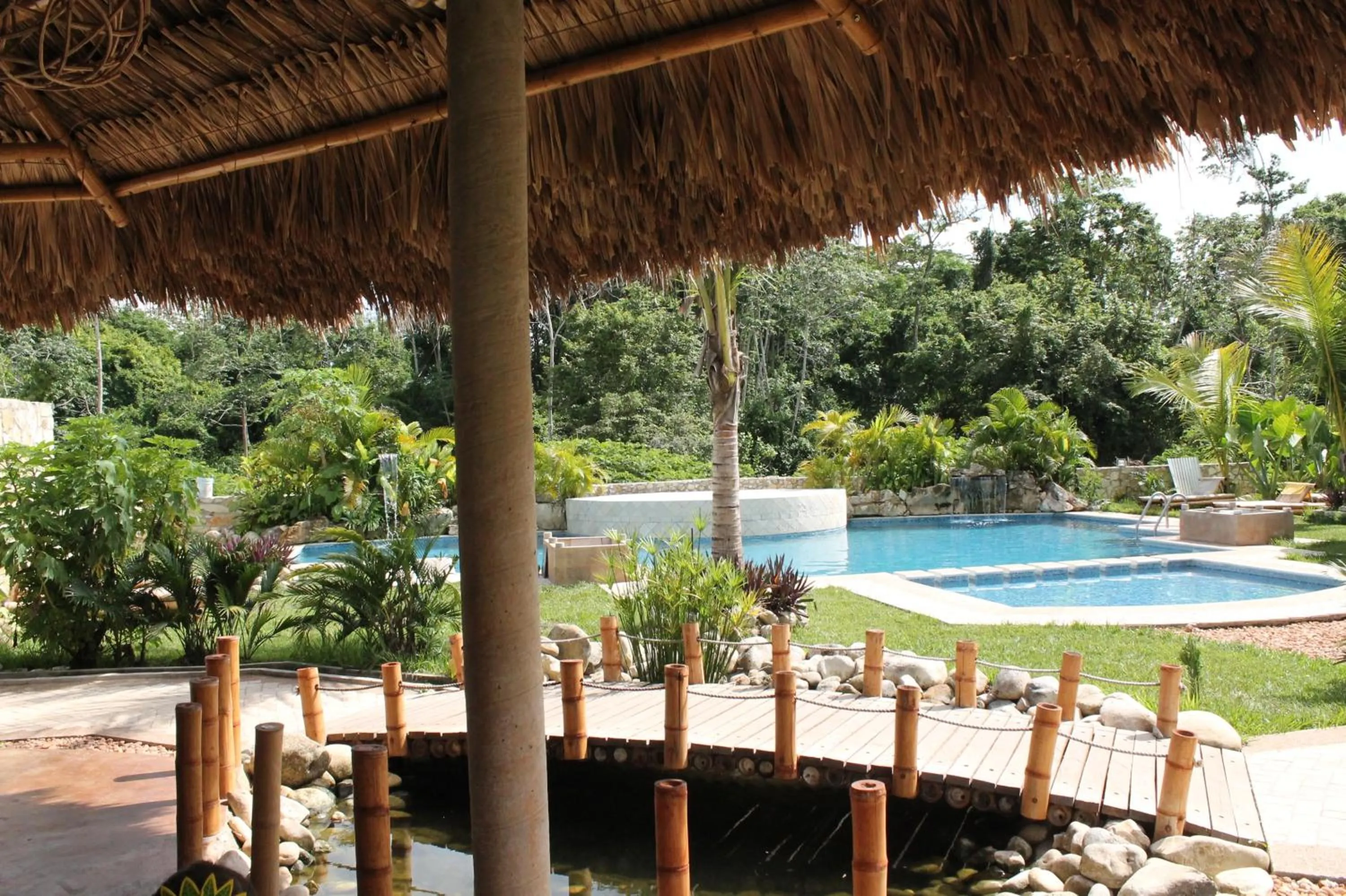 Swimming pool in AXKAN PALENQUE, ALBERCAS, GASTRONOMIA MAR y TIERRA & TRAVEL AGENCY