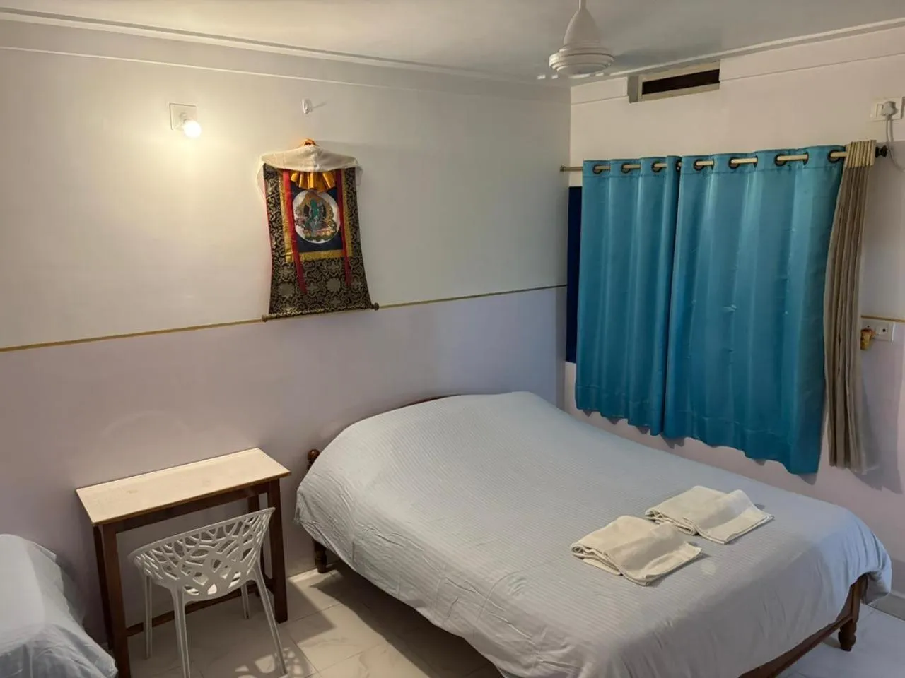 Bed in Tara Guest House