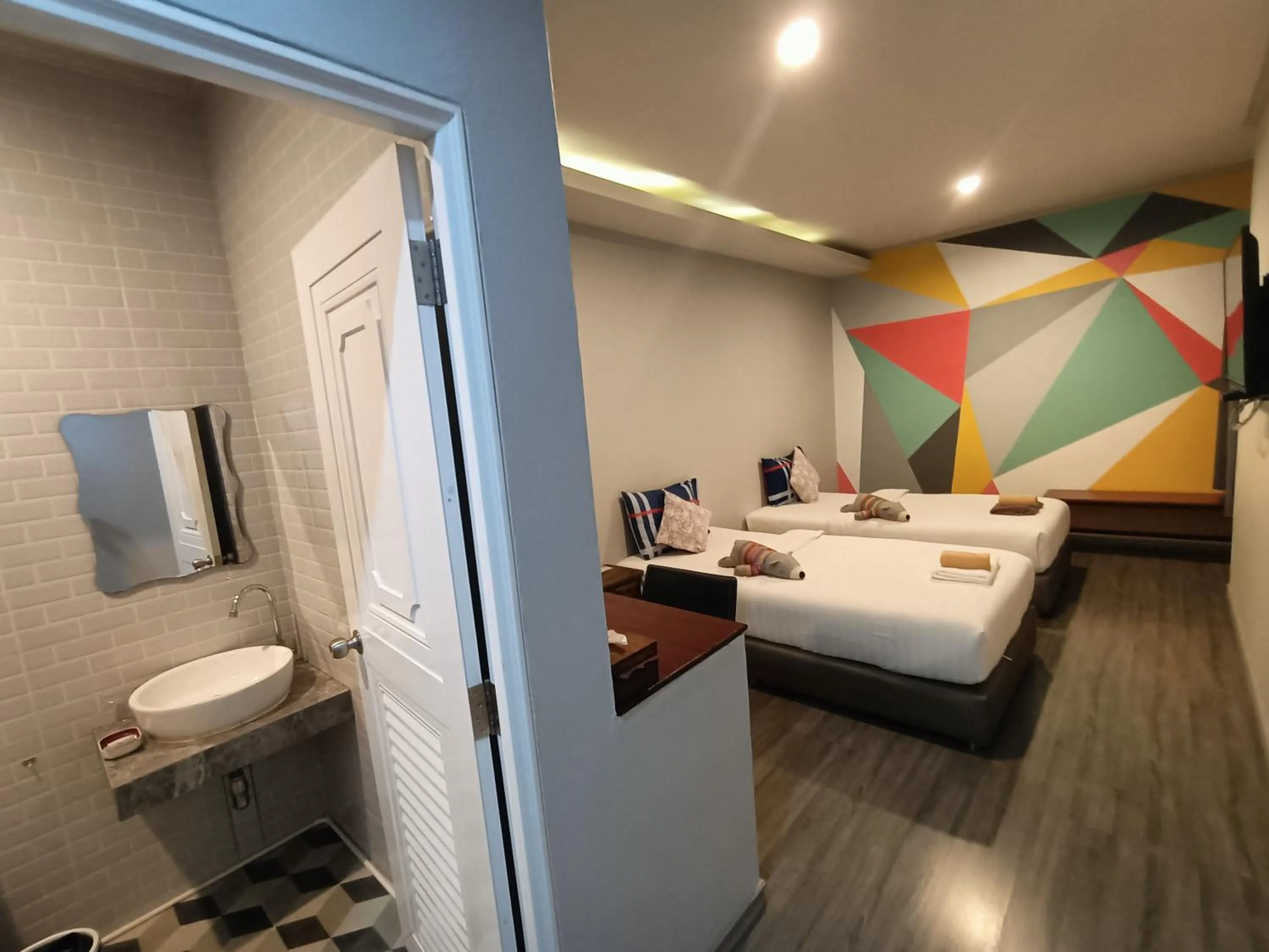 Bed in Aen Guy Boutique Hotel