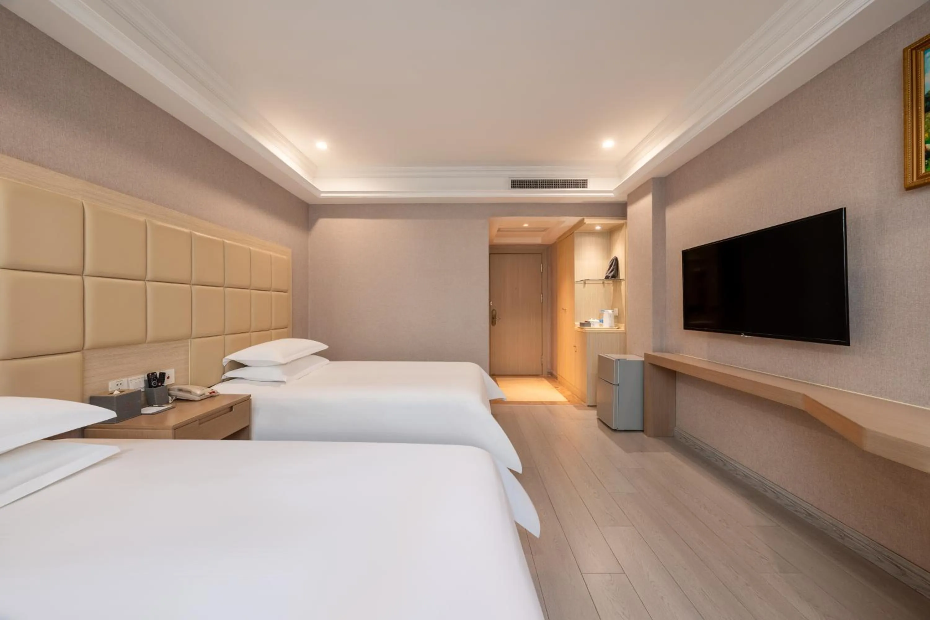 Bed in Rezen Select Shanghai International Resort