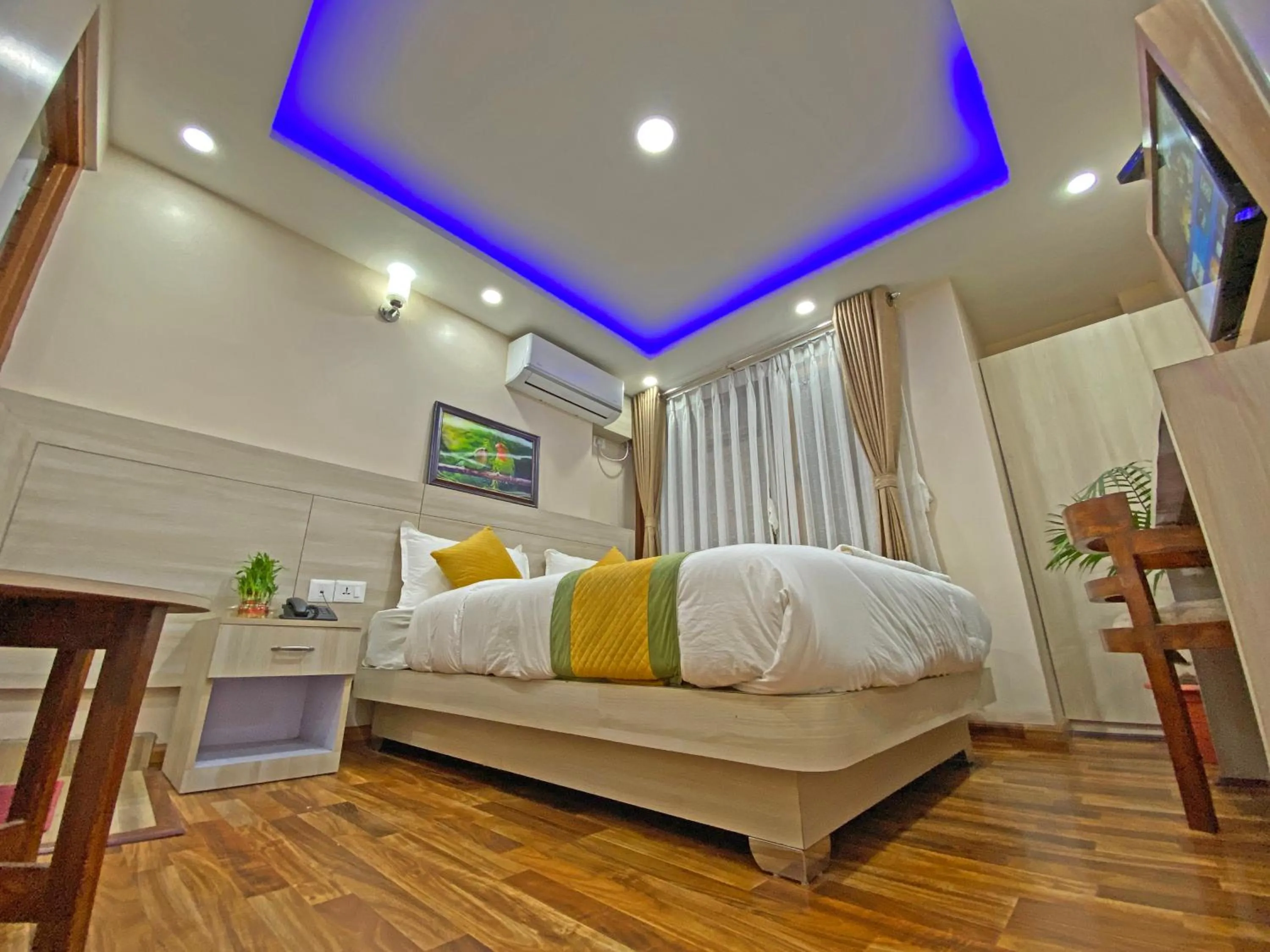 TV and multimedia, Bed in Hotel Aaradhya