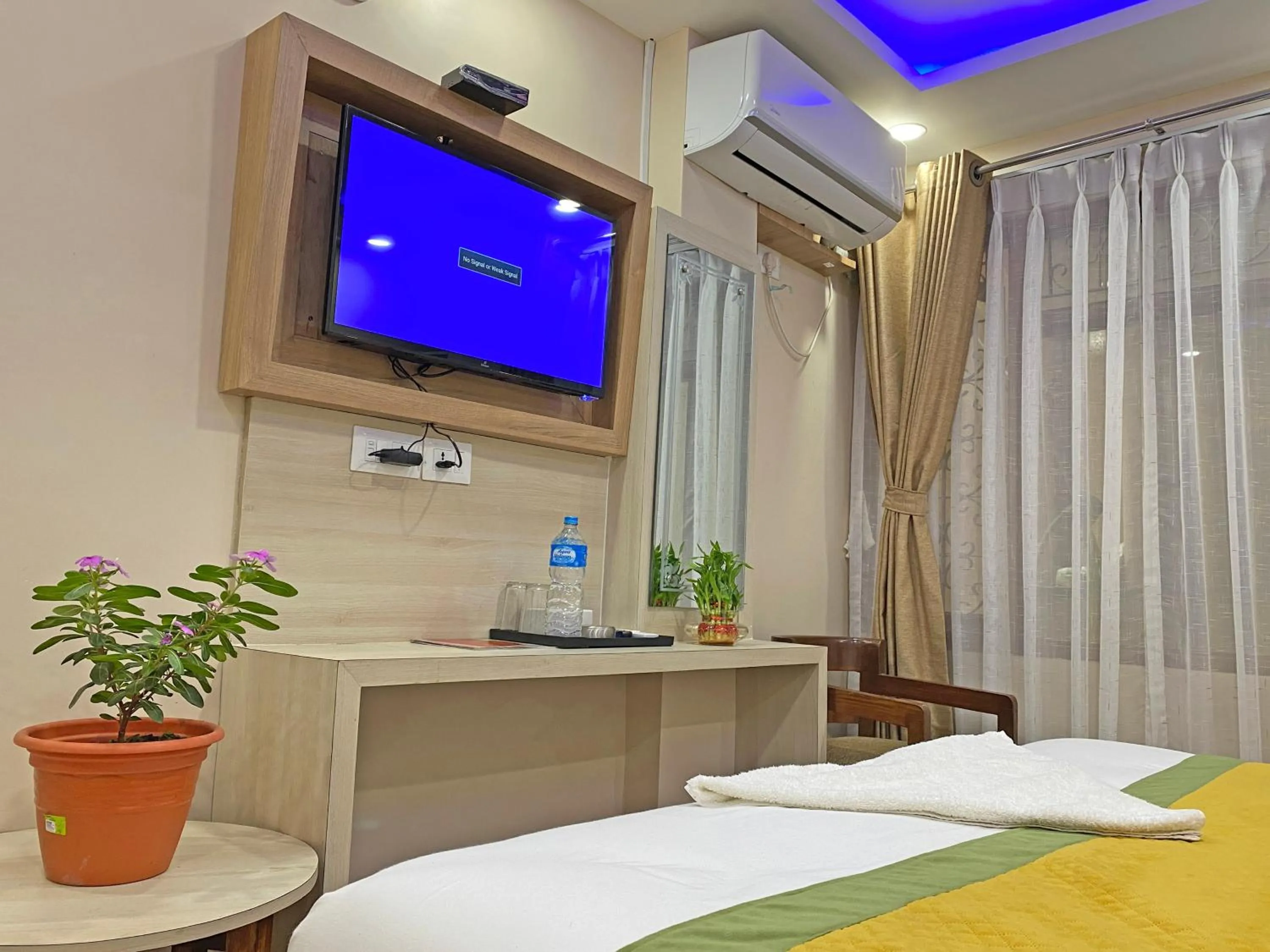 Bed in Hotel Aaradhya