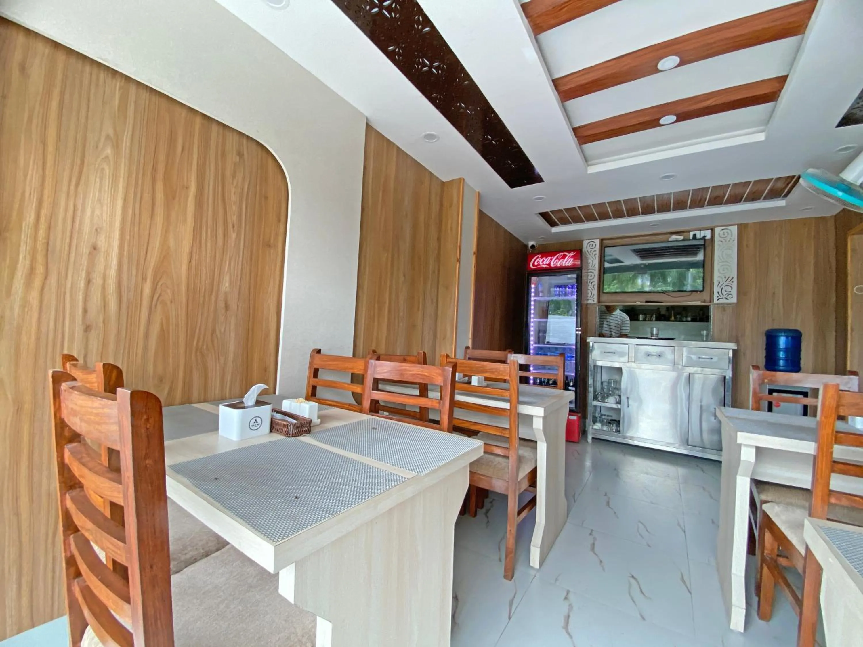 Kitchen or kitchenette in Hotel Aaradhya